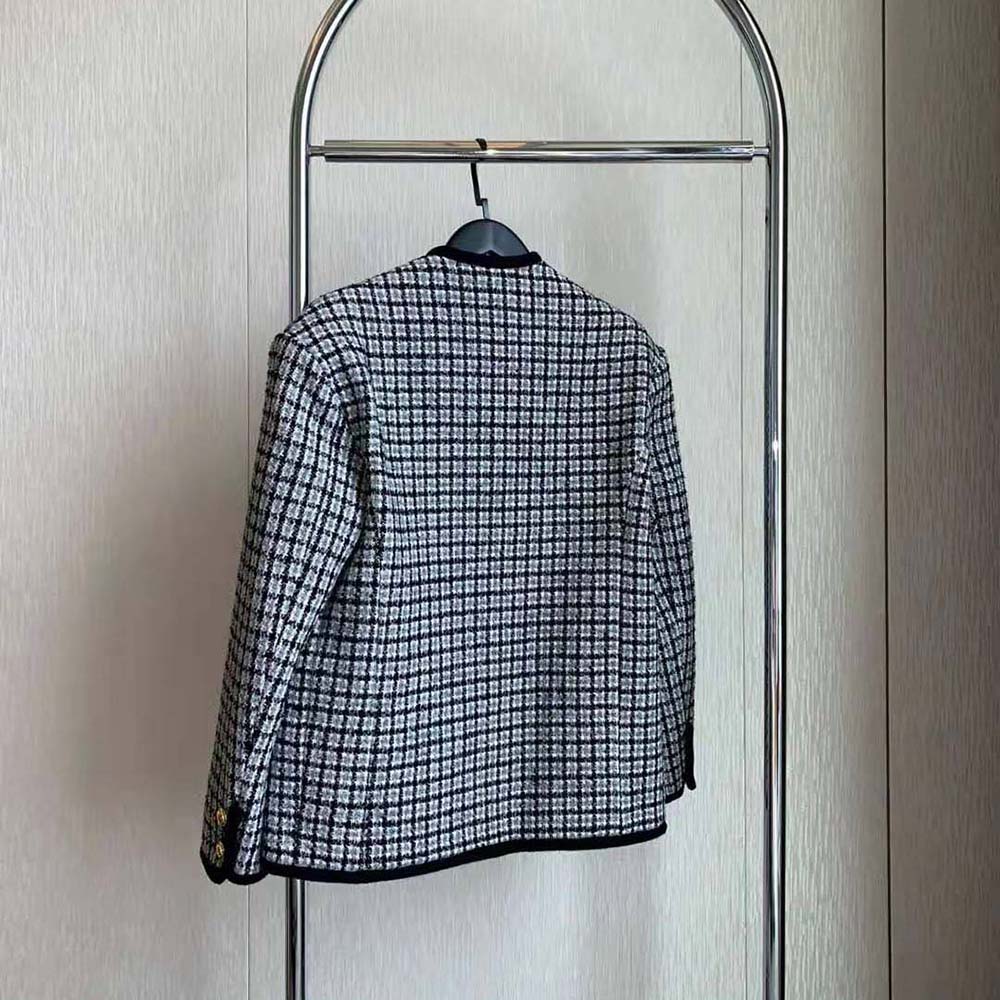 Side angle highlighting tailored silhouette of Miu Miu Women Single-breasted Boucle Jacket