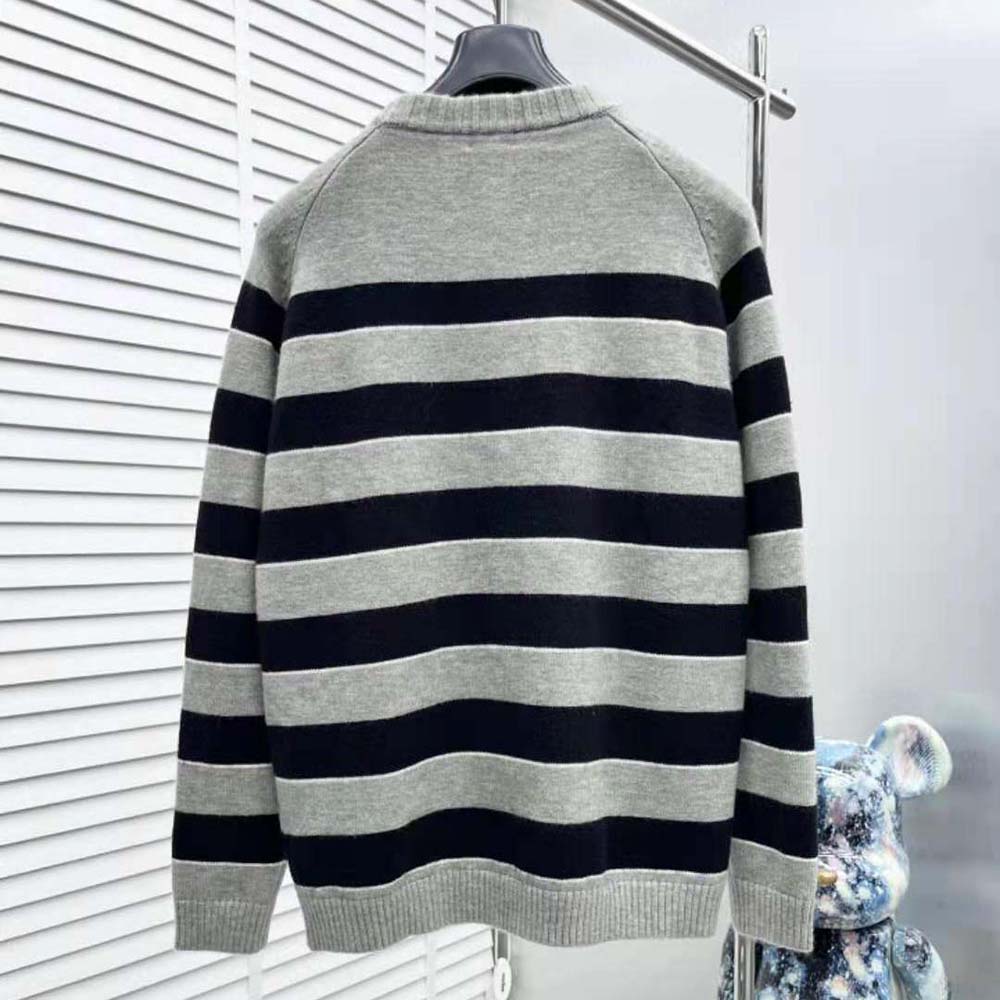 Side angle showcasing silhouette of Celine Women Triomphe Crew Neck Sweater