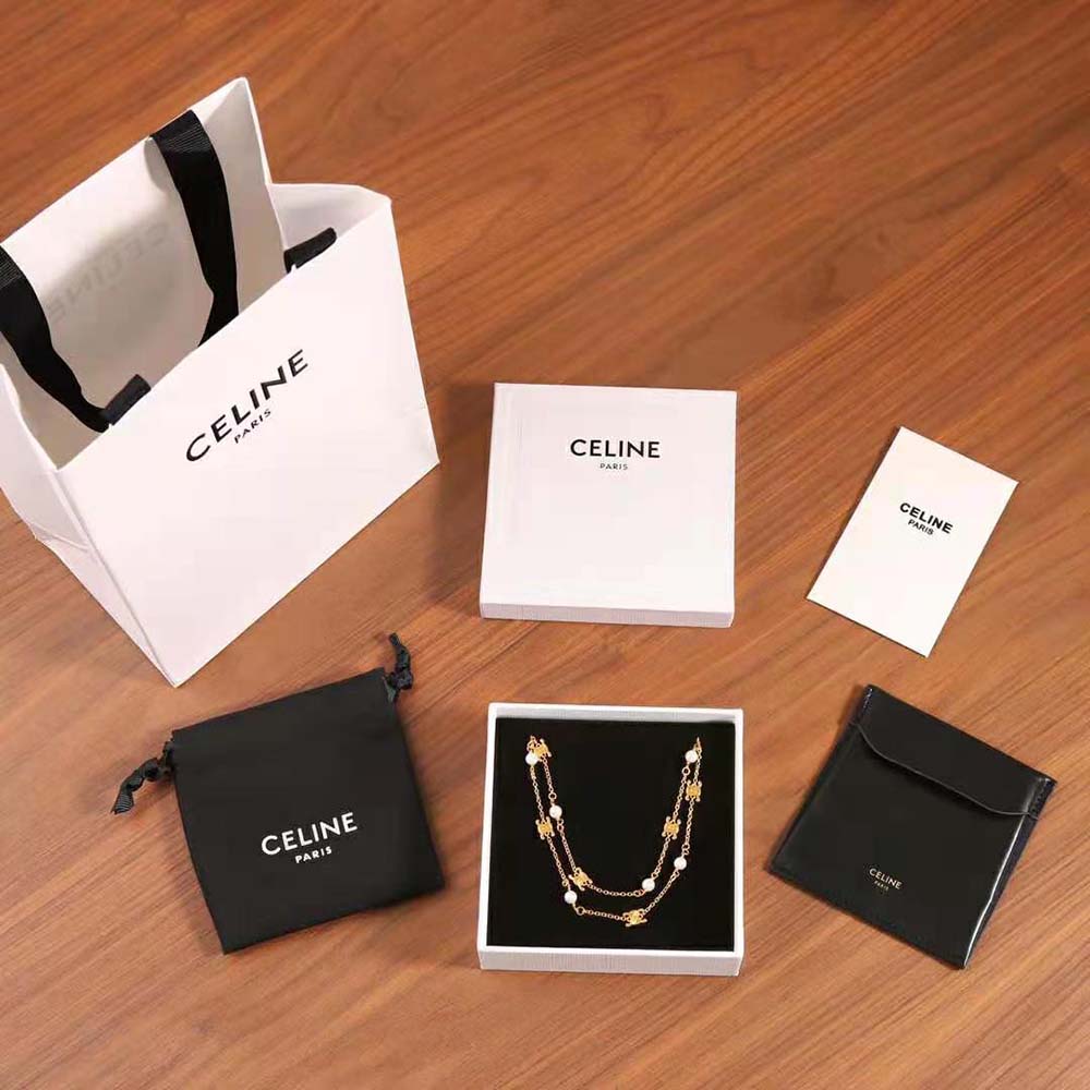 Close-up of resin pearls on Celine Women Triomphe Pearl Double Necklace