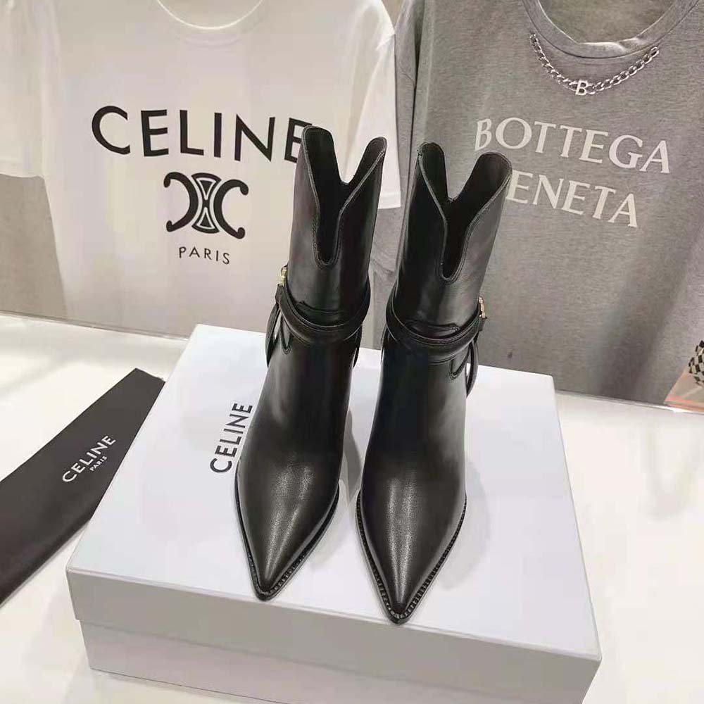 Front angle showing sleek silhouette of Celine Women Verneuil Triomphe Harness Low Boot