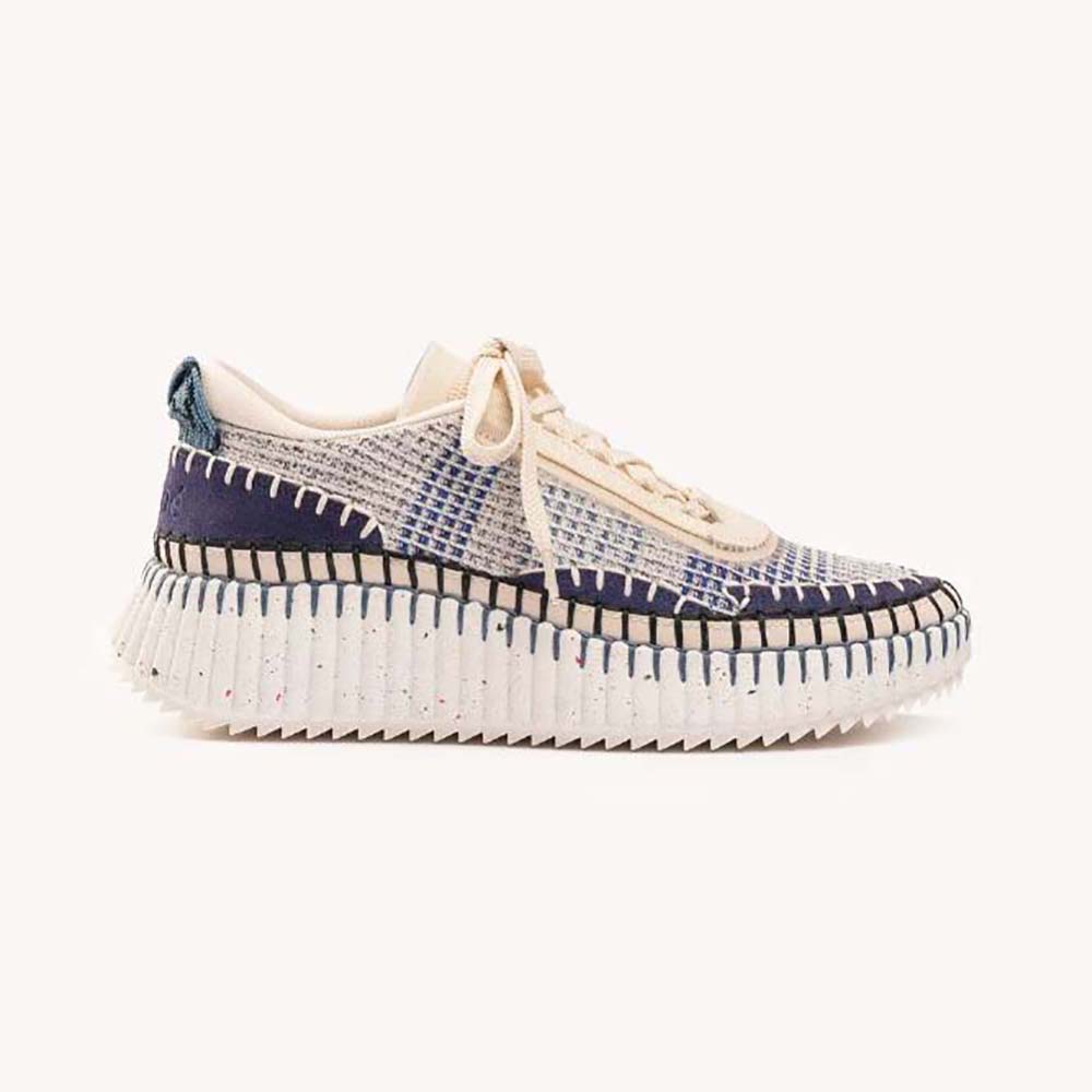 Side profile of Chloe Unisex Nama Sneaker-Blue showing smooth leather