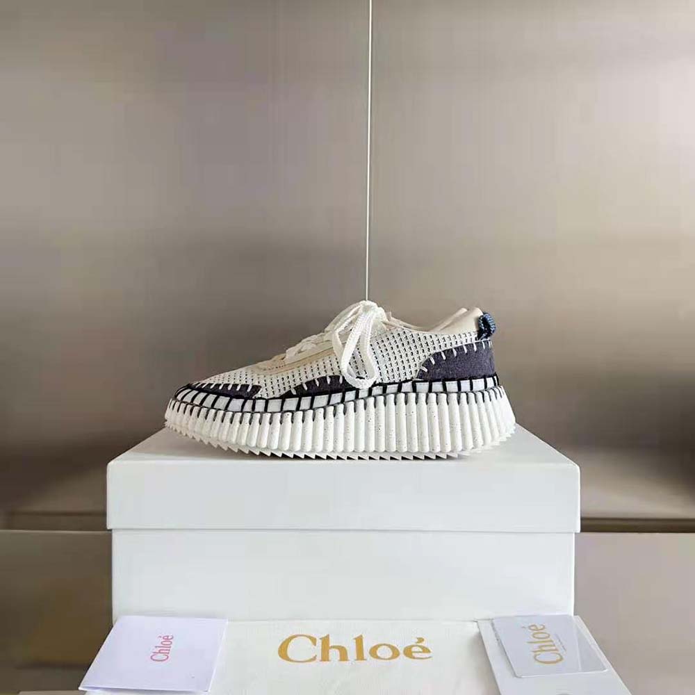 Close-up of blue laces and embossed Chloé branding on Nama Sneaker