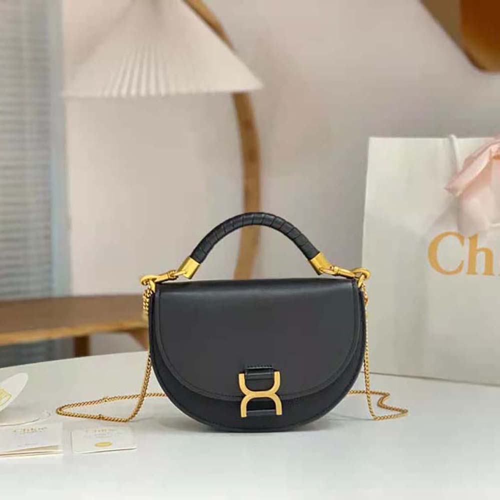 Close-up of gold-tone braided chain hardware on Chloé Women Marcie Chain Flap Bag-Black