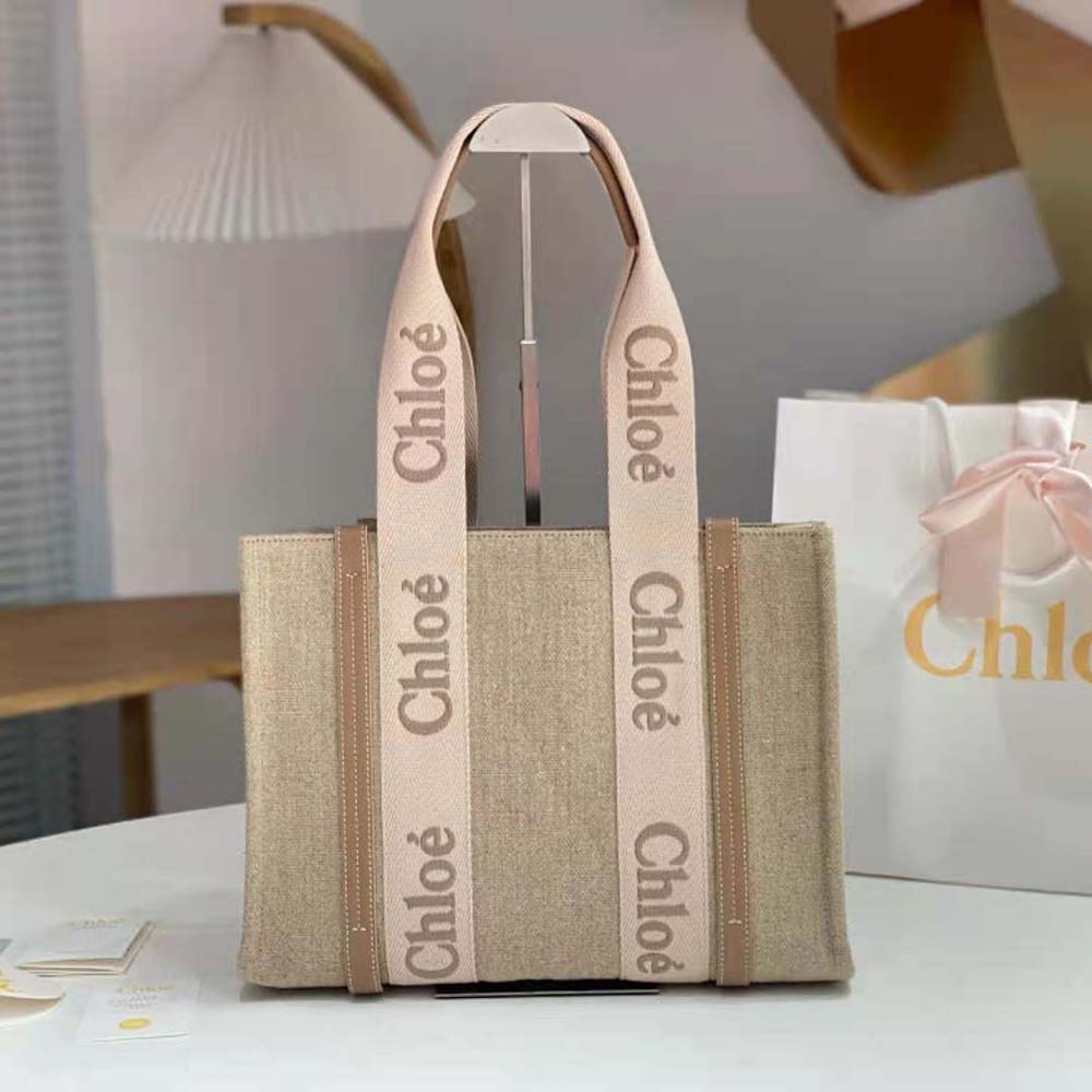 Close-up of gold hardware and zip detail on Chloe Women Medium Woody Tote Bag-Beige