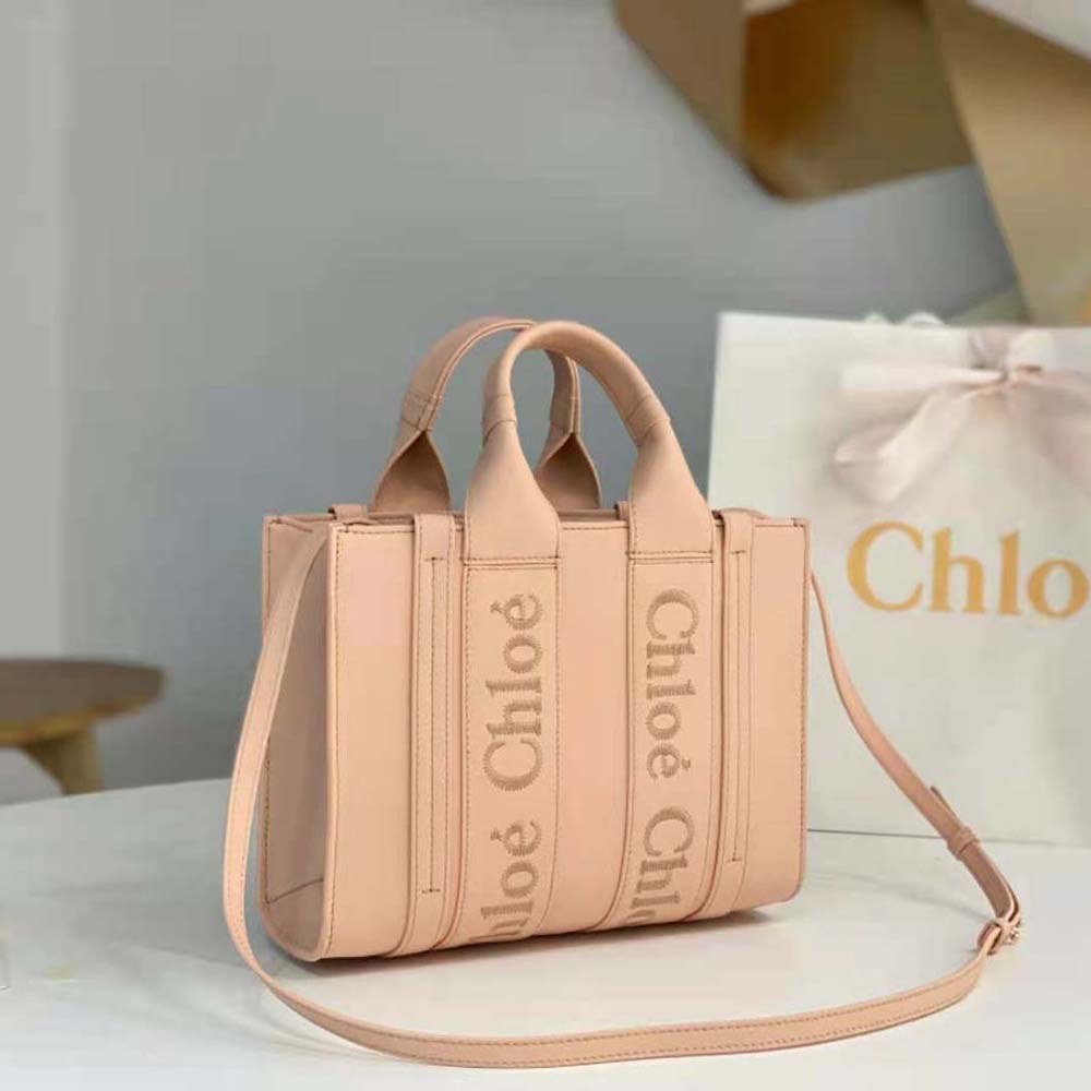 Side angle of Chloe Women Mini Woody Tote Bag-Pink with shoulder strap