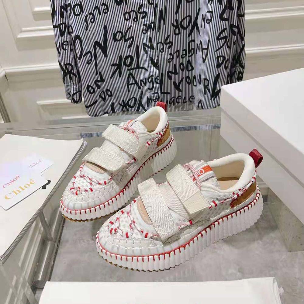 Overhead shot showing beige leather and rubber sole of Chloe Nama sneaker