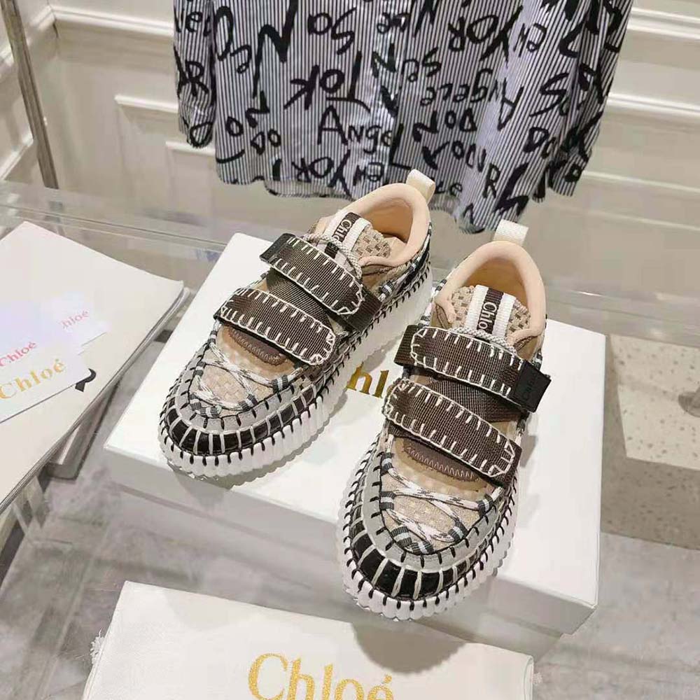 Top angle of Chloe Women Nama Slip-on Sneaker-Brown highlighting elastic sides
