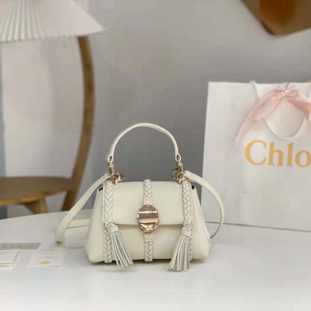 Close-up detail of gold hardware on Chloe Women Penelope Mini Soft Shoulder Bag-White