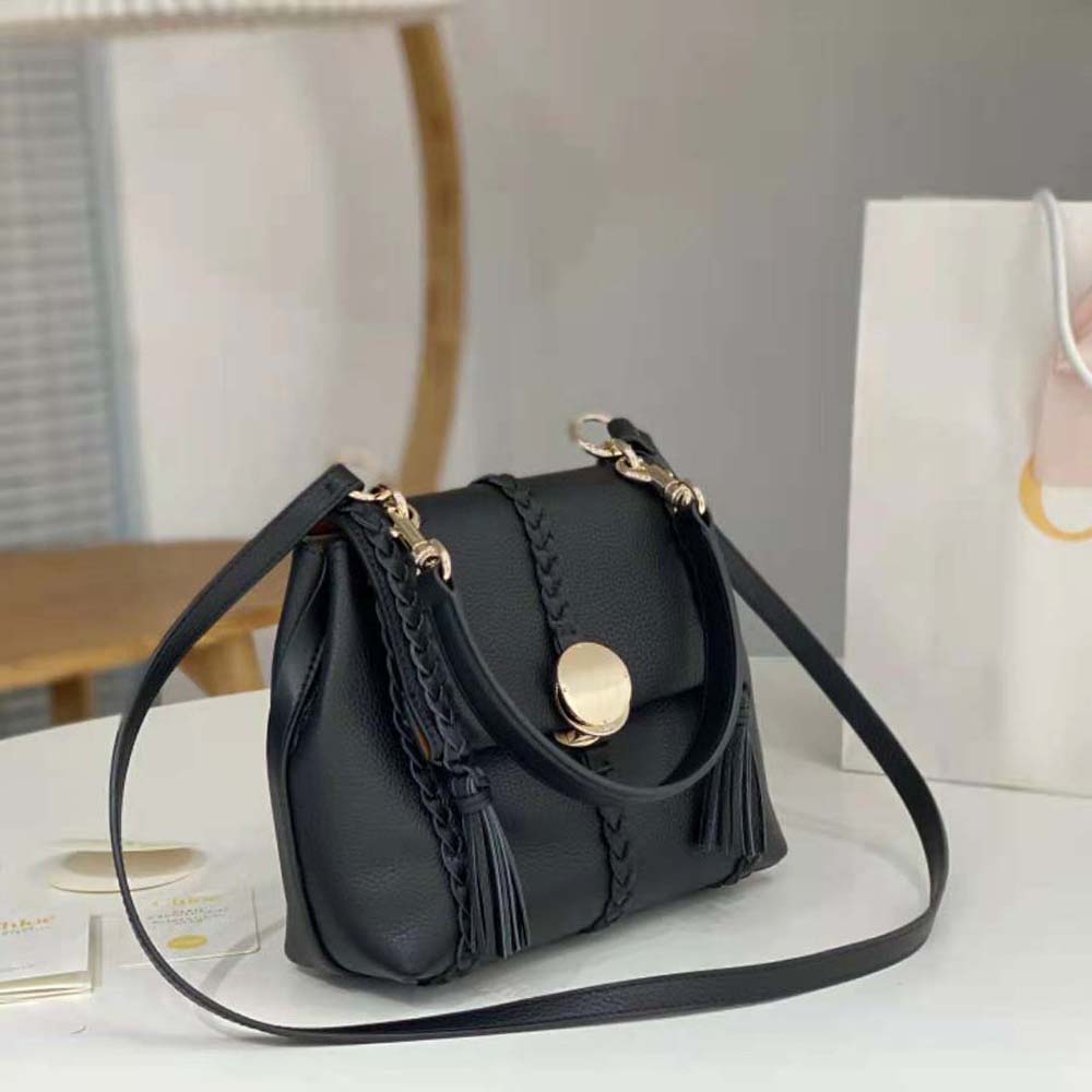Side view showing soft silhouette of Chloe Women Penelope Small Soft Shoulder Bag-Black