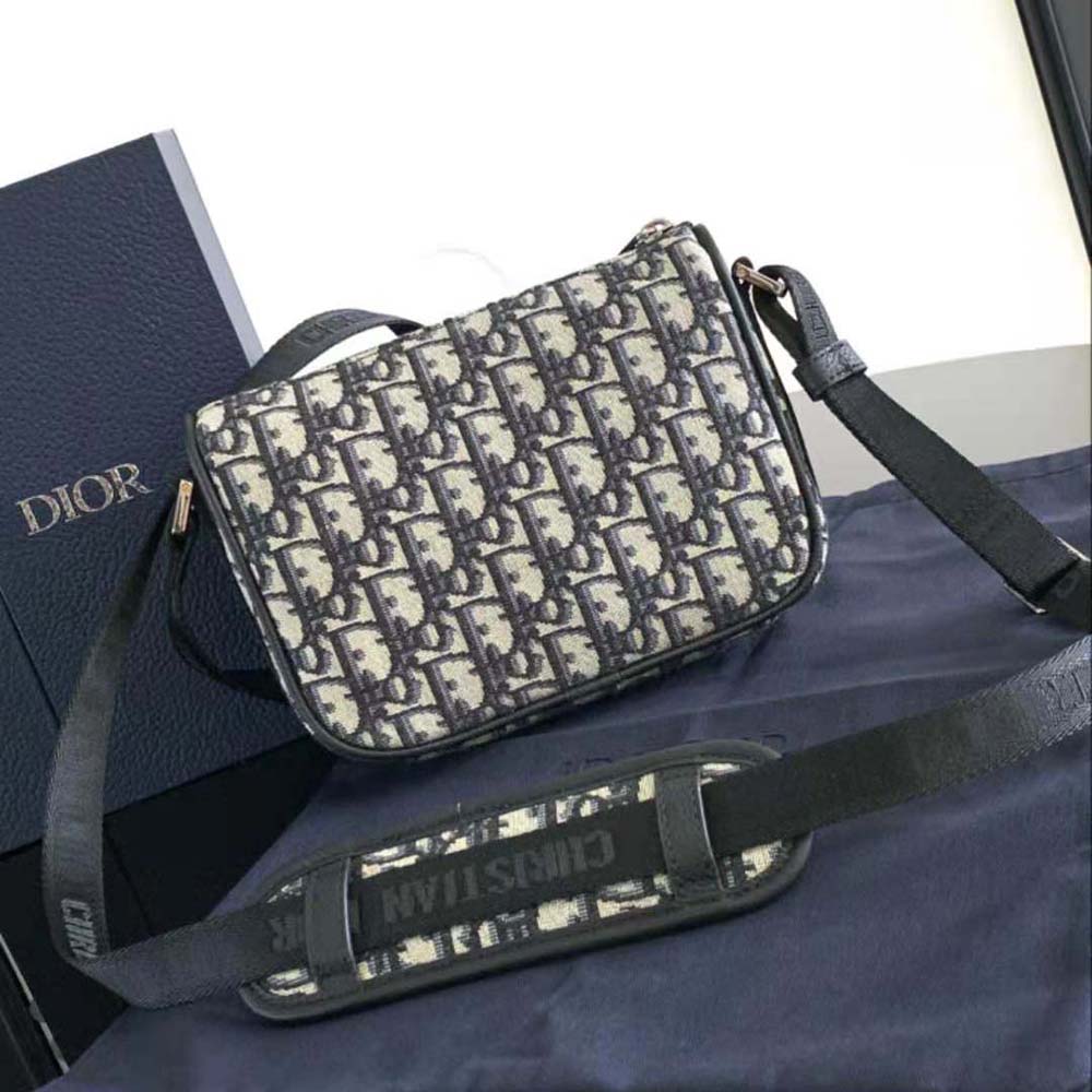 Side angle showing compact silhouette of Dior Men 8 Mini Bag with Strap