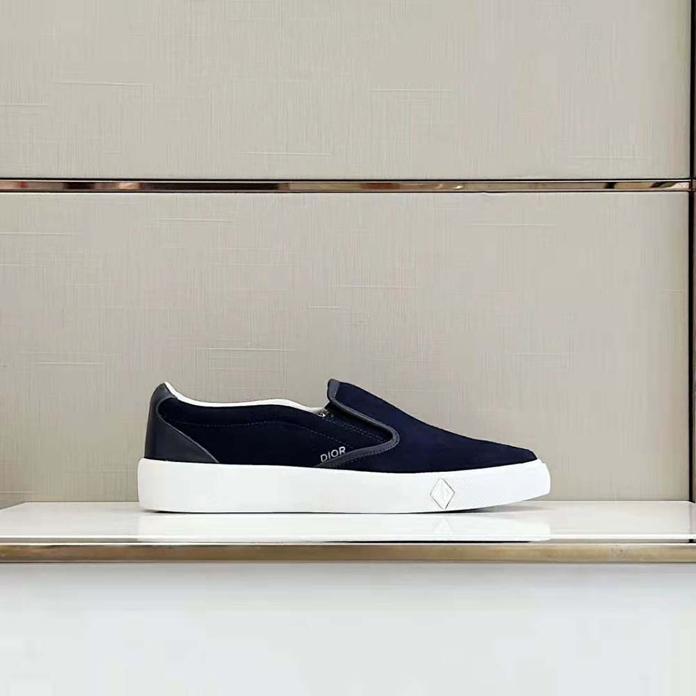 Close-up of navy blue suede texture on Dior Men B101 Slip-on Sneaker