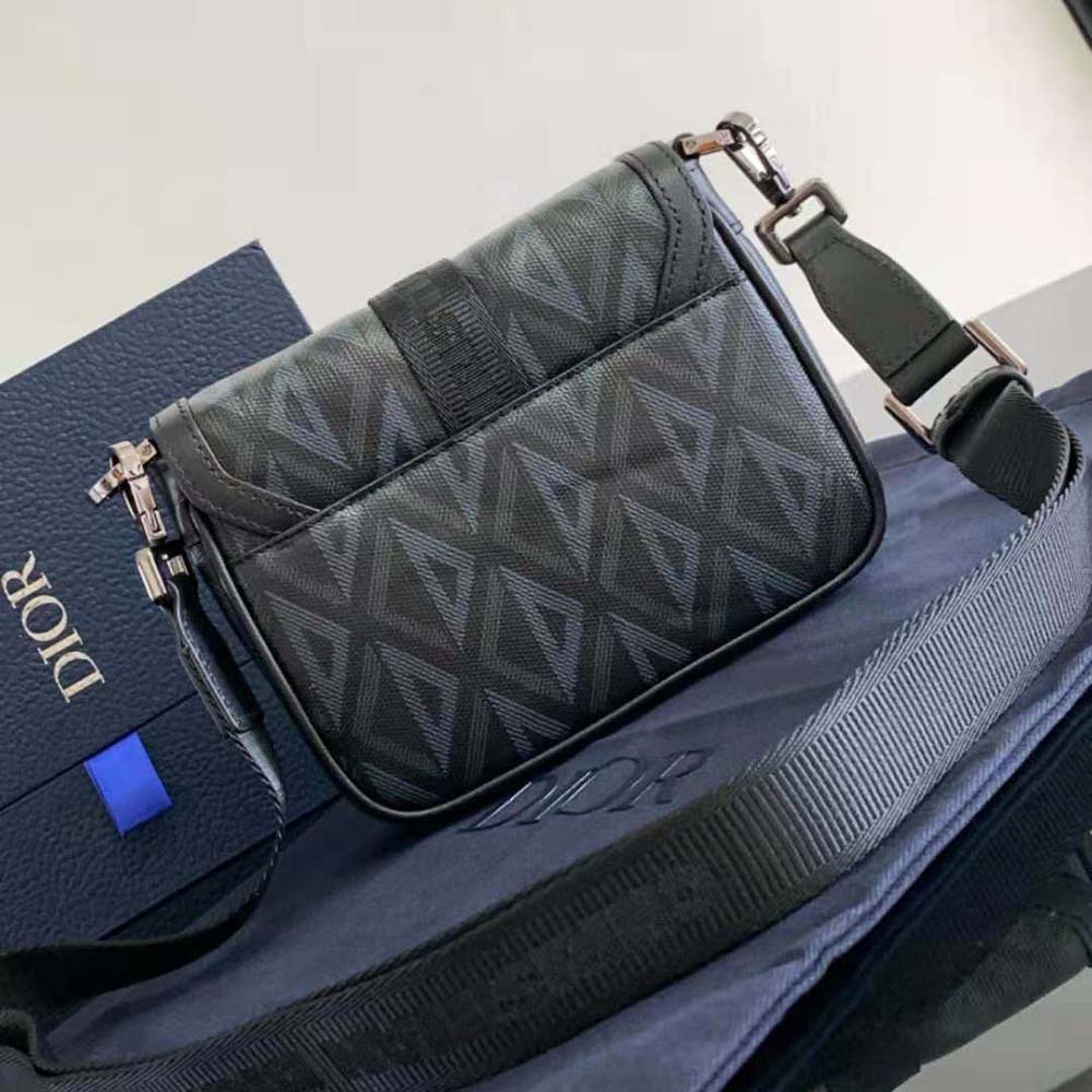 Side profile showing slim silhouette of Dior Men Mini Dior Hit the Road Bag