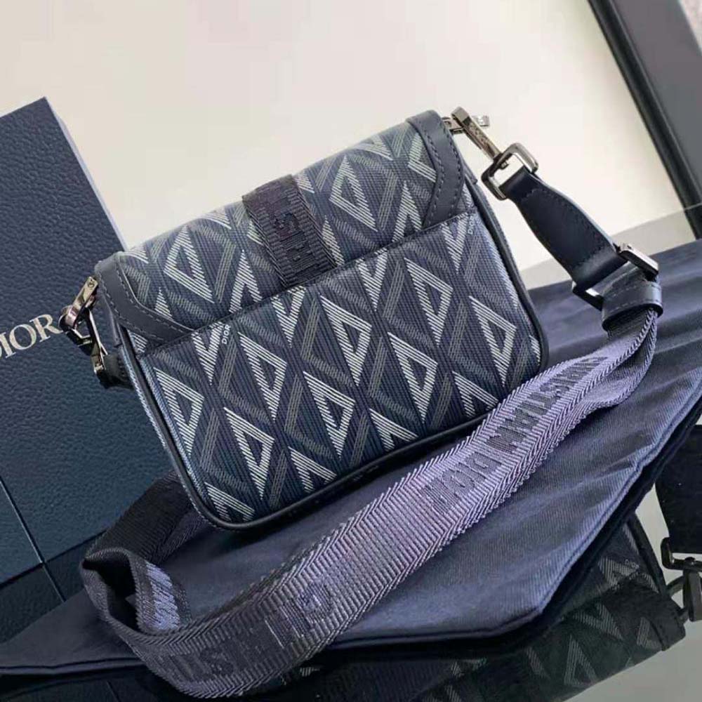 Side angle showing zipper and leather pull of Mini Dior Hit the Road Bag