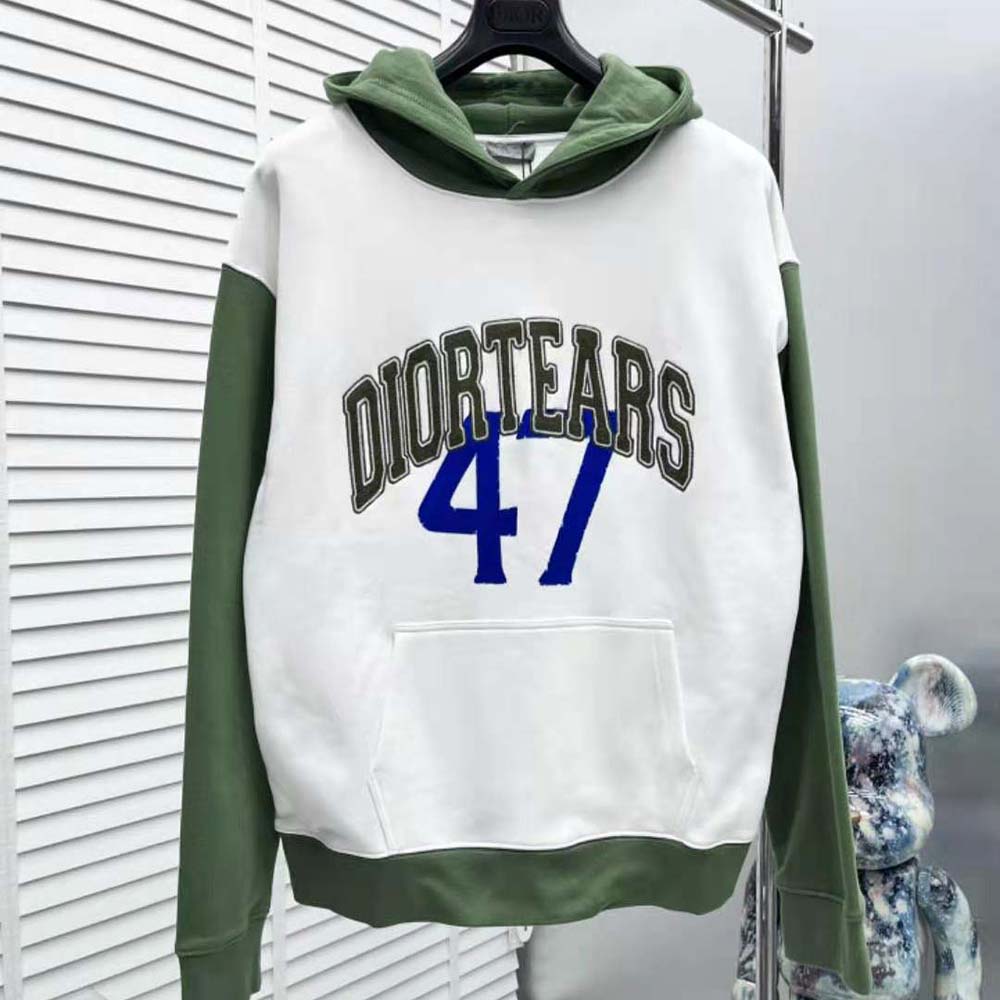 Close-up detail of green tears graphic on Dior Men Tears Oversized Hooded Sweatshirt
