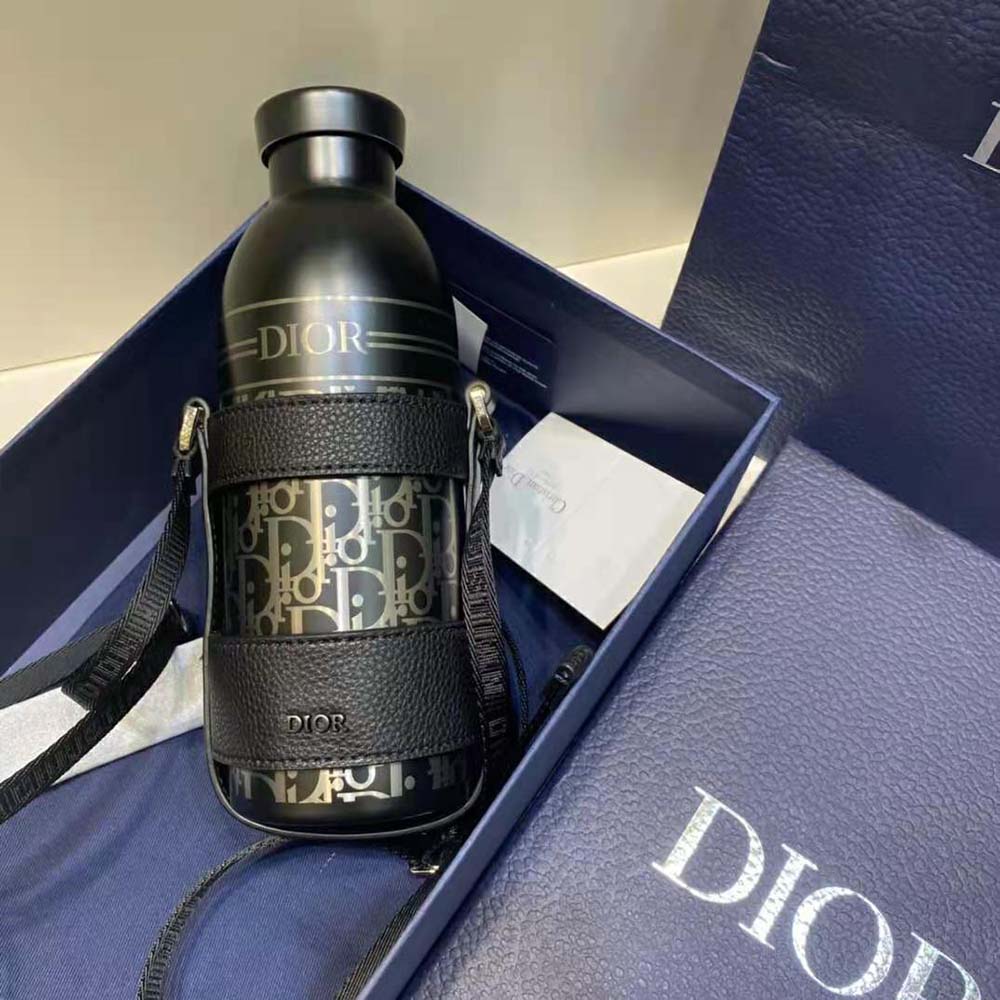 Close-up of black grained calfskin and Dior Oblique stainless steel hardware