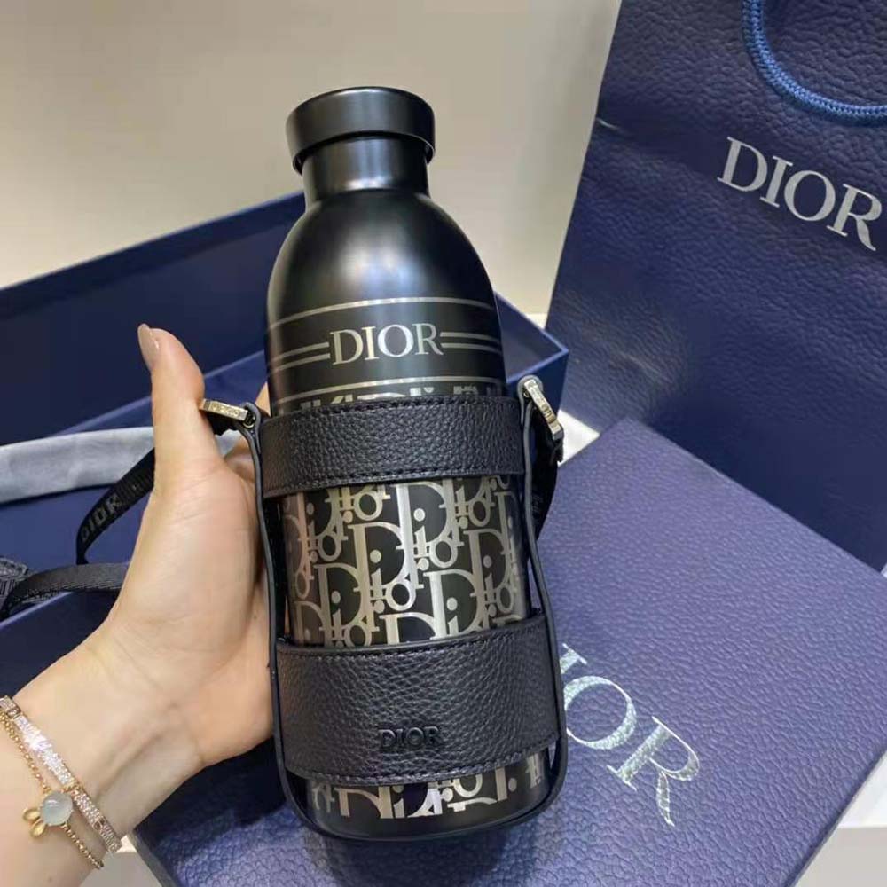 Side angle showing adjustable shoulder strap on Dior Unisex Aqua Bottle