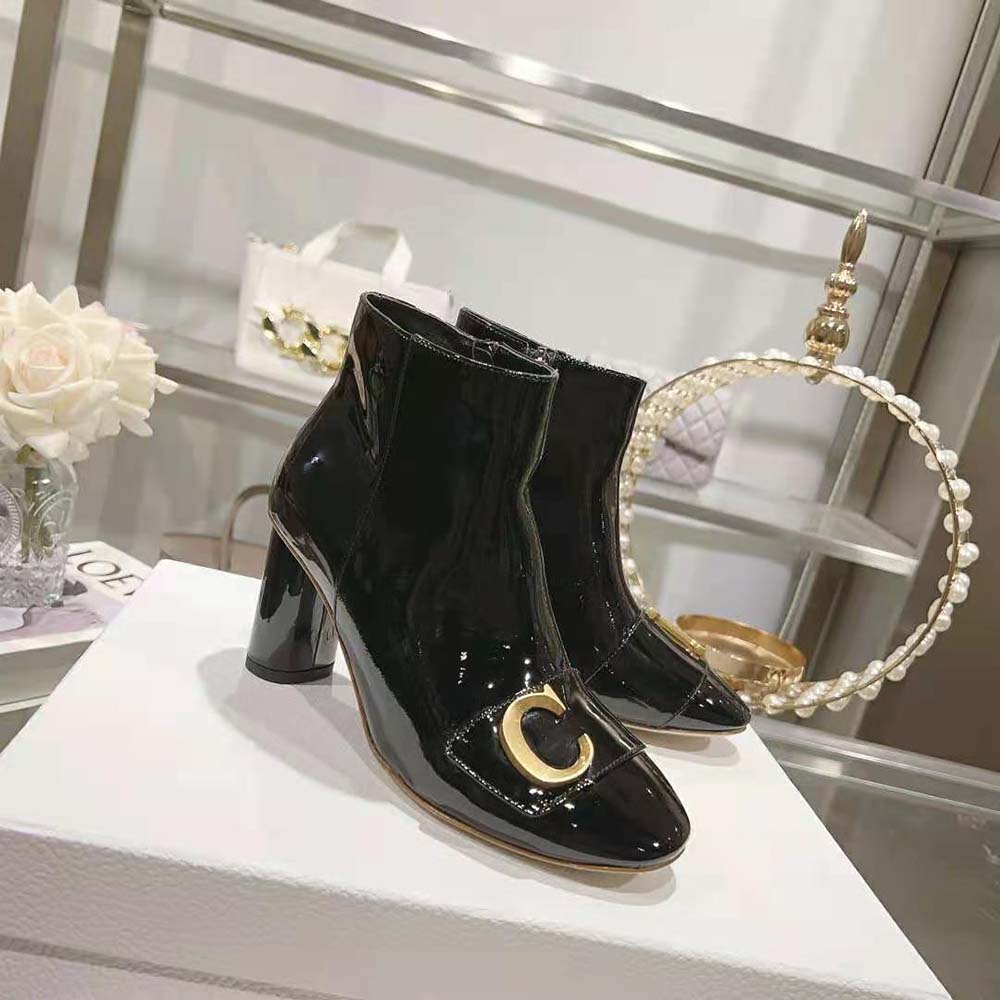 Close-up on embossed heel detail of Dior Women C’est Dior Heeled Ankle Boot