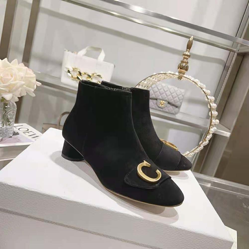 Top view showing black calfskin lining and zip closure on Dior ankle boot