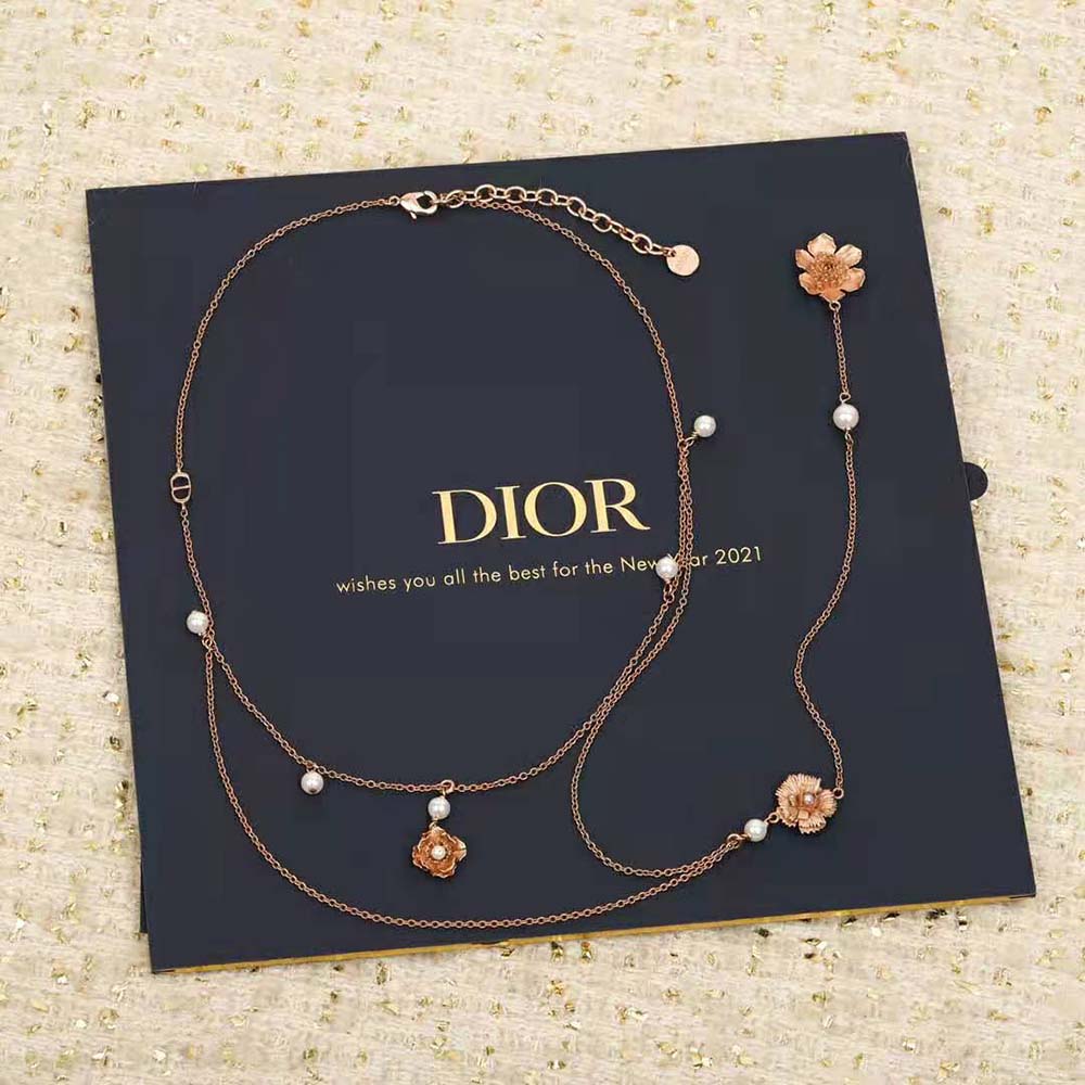 Close-up detail of white resin pearls on Dior Women D-Millefiori Necklace