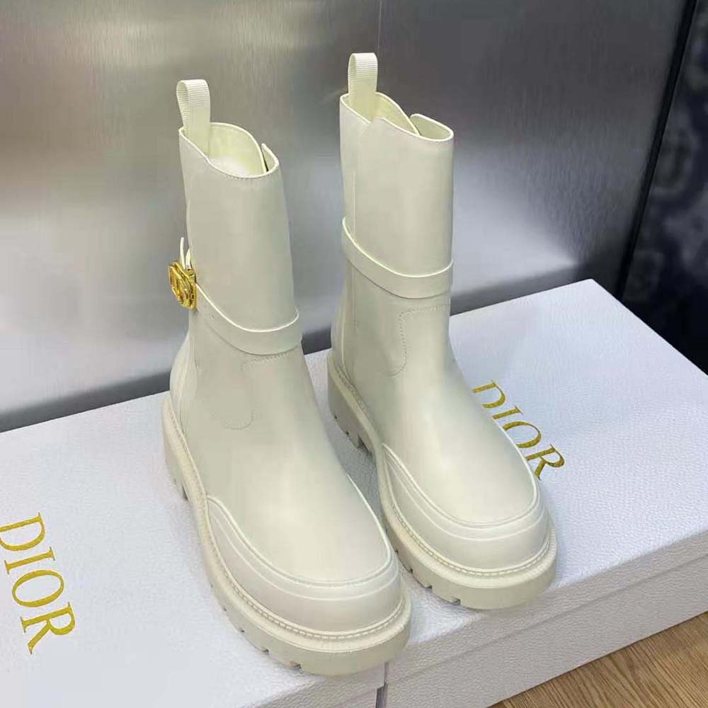 Close-up on Dior embossed detail and white calfskin texture
