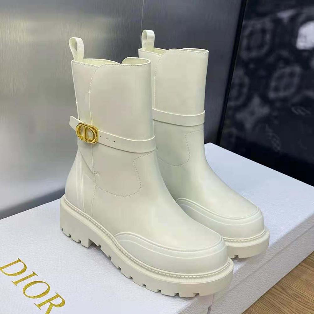 Rear view highlighting rubber sole and ankle height of Dior boot