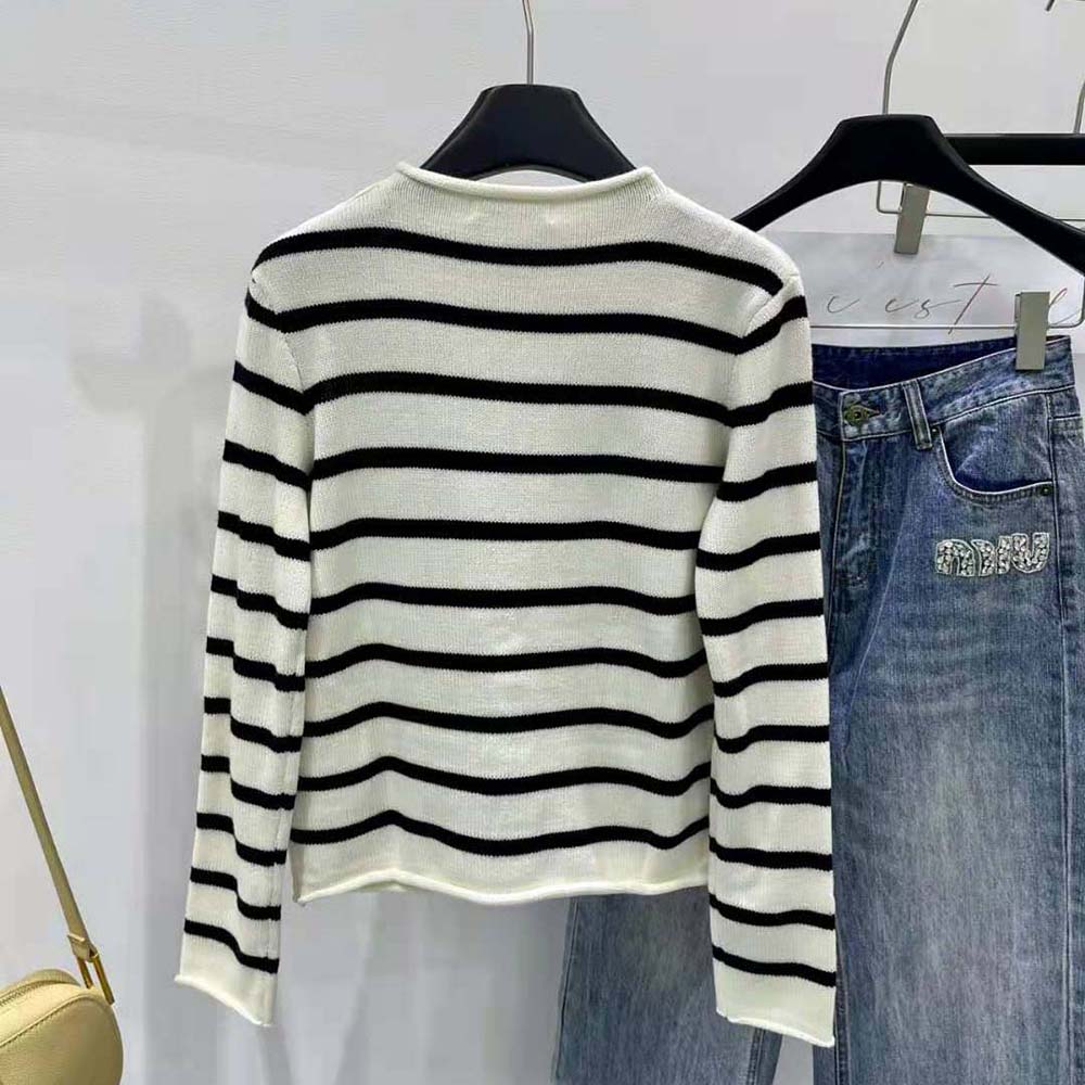Side angle showing relaxed fit of Dior Women Marinière sweater