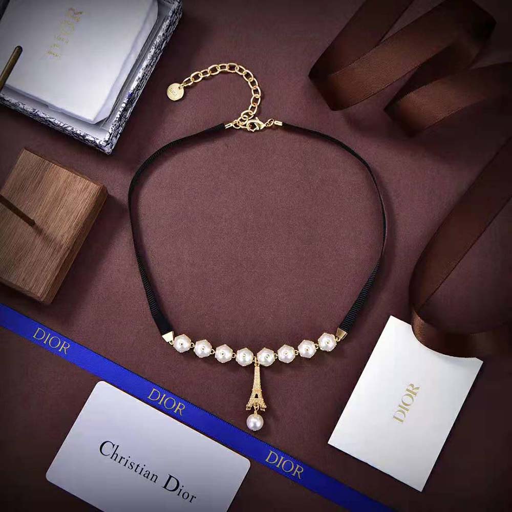 Close-up detail of white resin pearls on Dior Women Plan De Paris Choker
