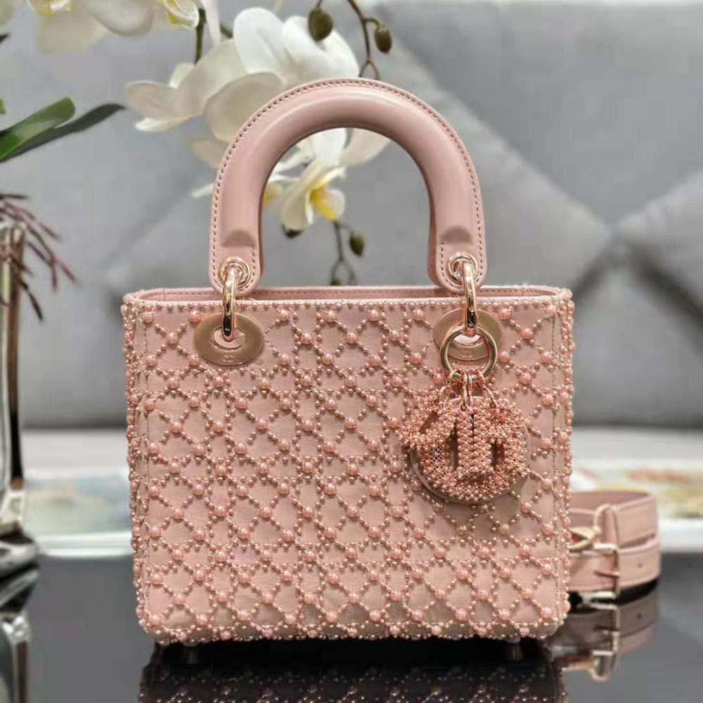 Close-up of pearl embroidery detail on Dior Women Small Lady Dior Bag Rose Des Vents Cannage Calfskin