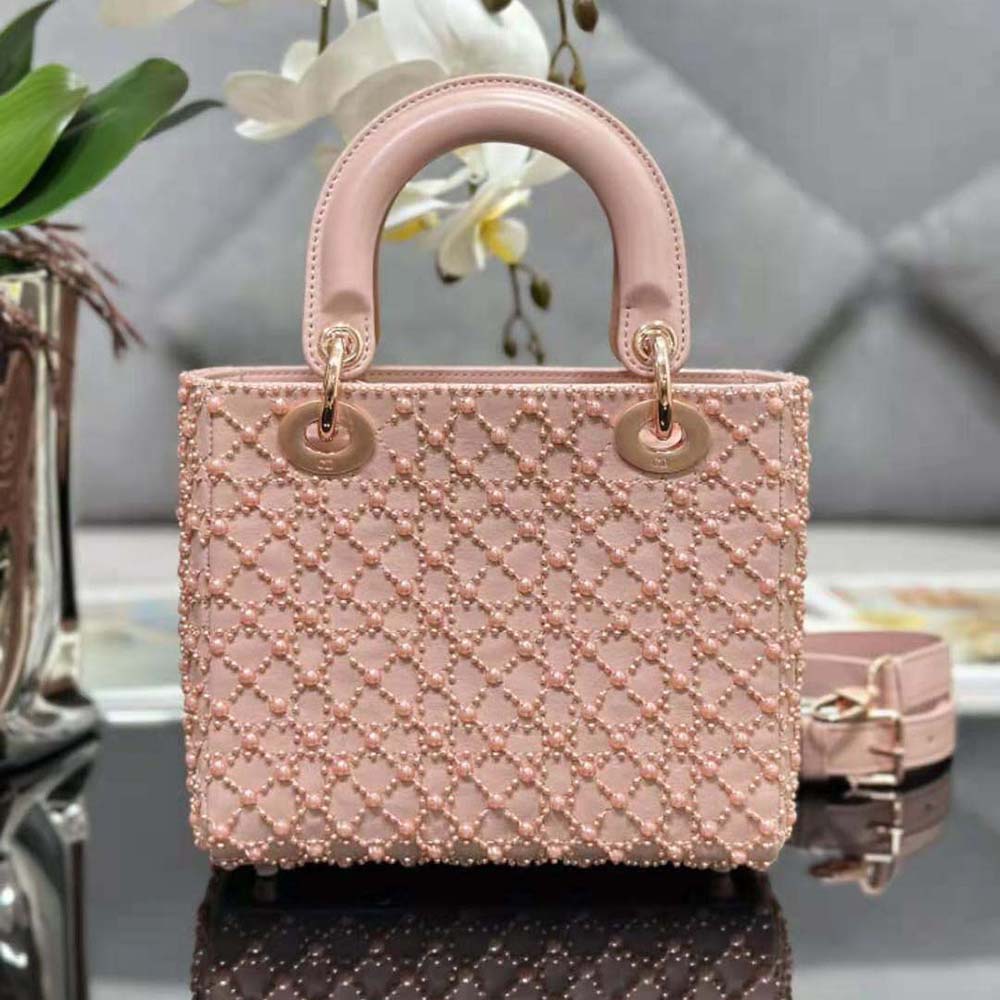 Side angle showcasing silver hardware and chain strap of Dior Women Small Lady Dior Bag Rose Des Vents
