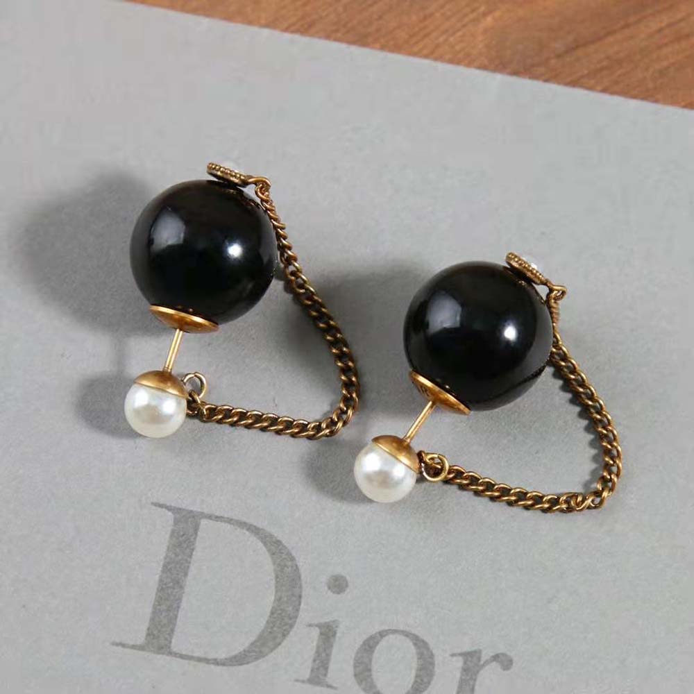 Detail of black and white resin pearls on Dior Women Tribales Earrings
