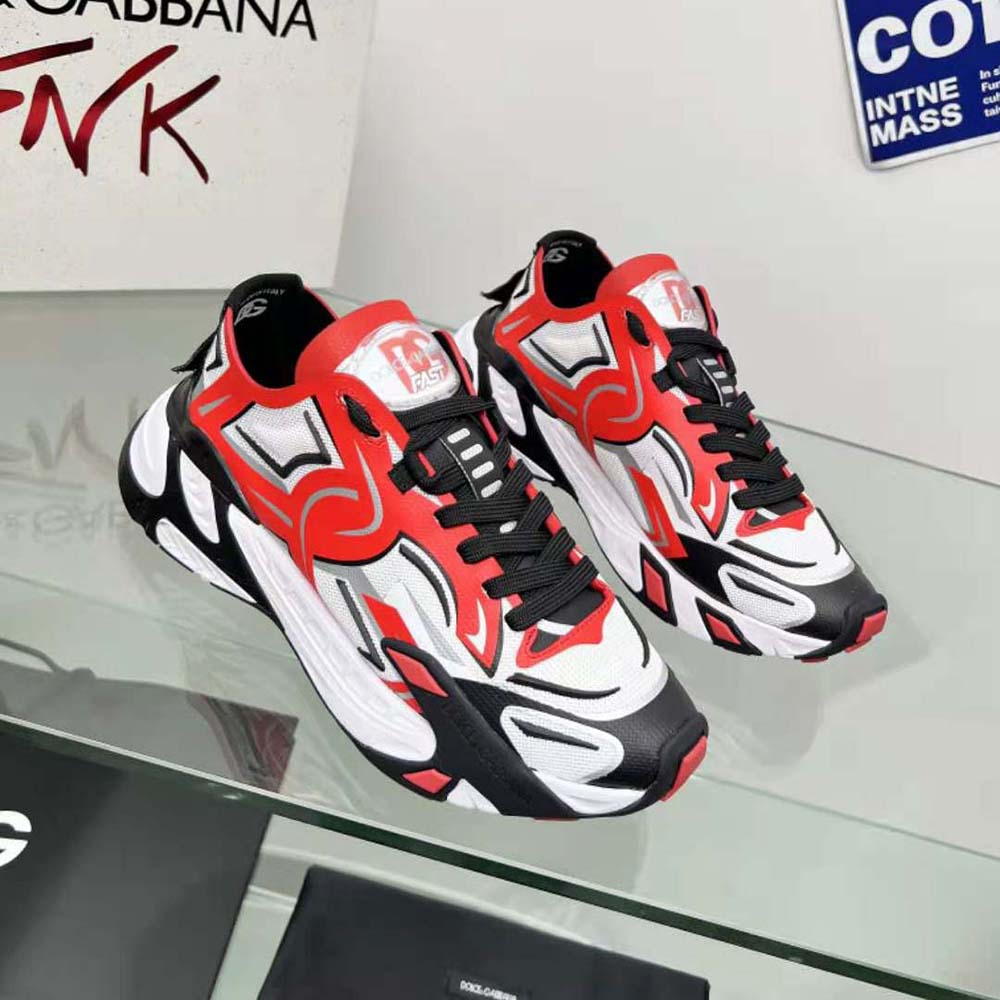Close-up of red lace-up closure and signature D&G logo on sneakers