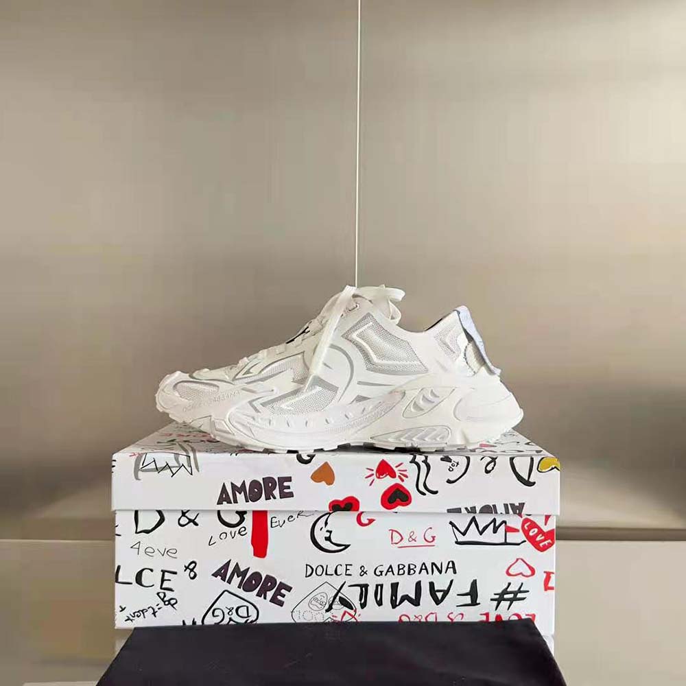 Close-up of laces and D&G logo on sneakers in white