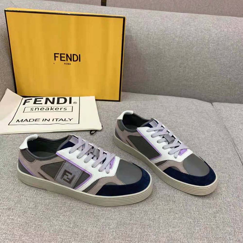 Top-down view highlighting smooth gray leather texture on Fendi Men Step sneakers