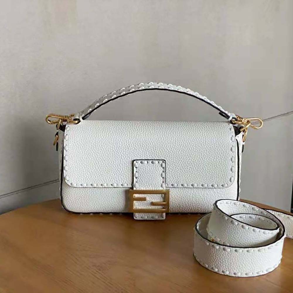 Close-up of oversized topstitching detail on Fendi Women Baguette Camellia Selleria Bag