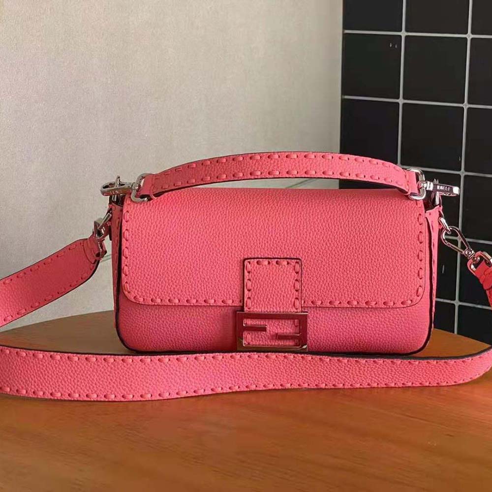 Close-up of pink leather and gold-tone hardware on Fendi Selleria bag