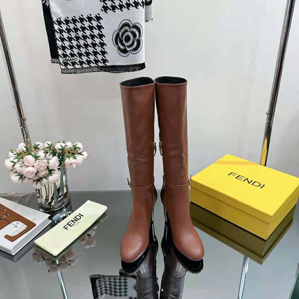 Close-up of gold-tone hardware on Fendi Women Delfina Leather High-heeled Boots-Brown