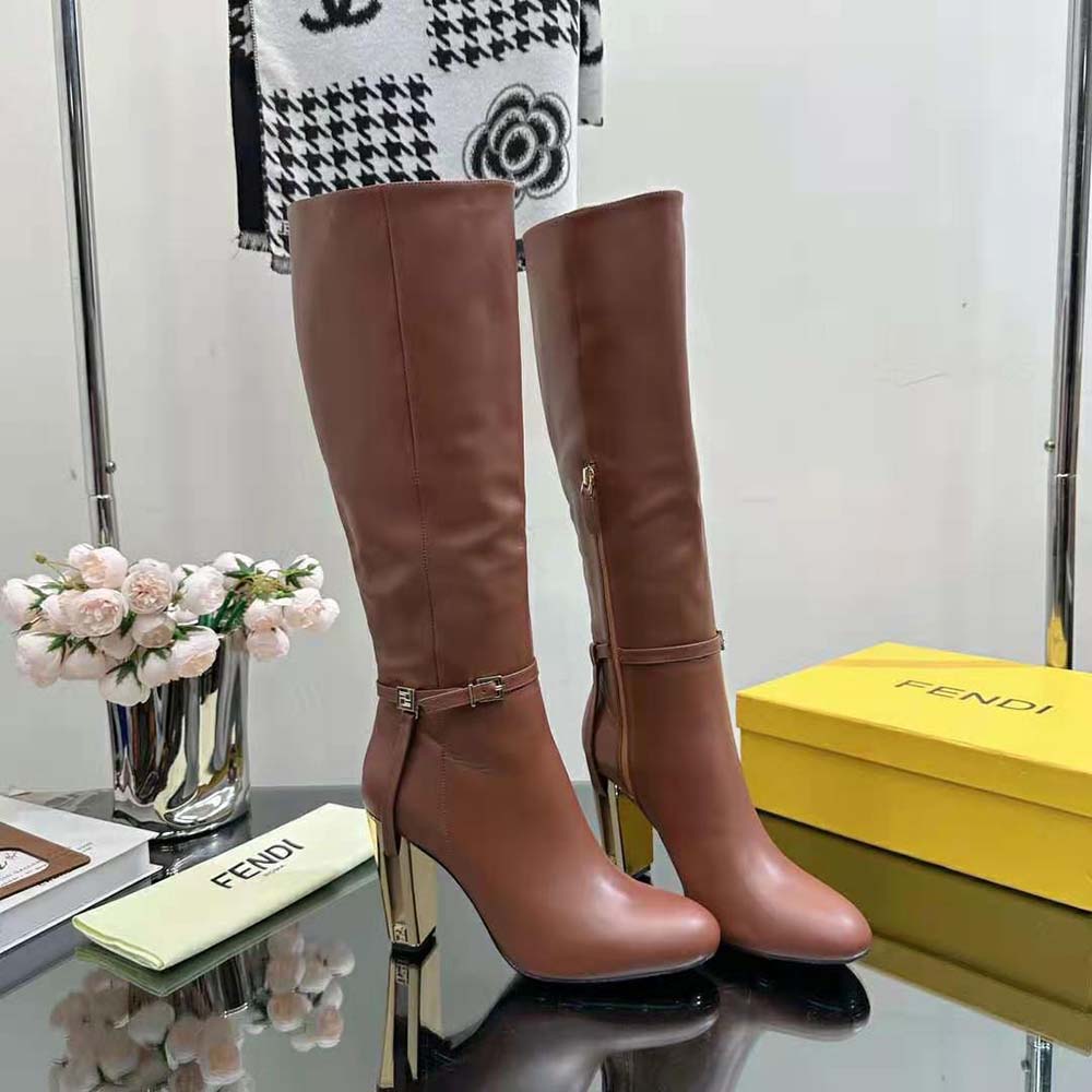 Angle showing smooth brown leather and high heel of Fendi Women Delfina Boots