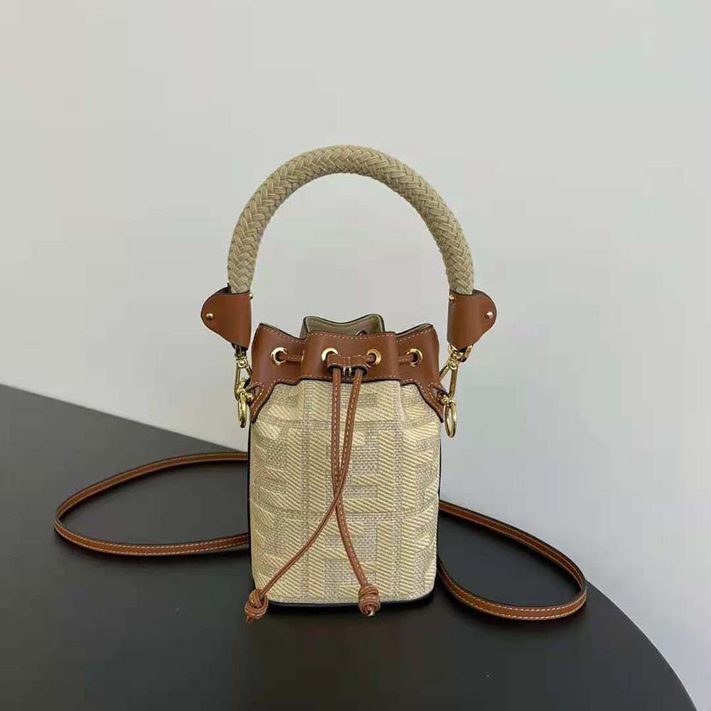 Close-up of Fendi Women Mon Tresor Natural Straw Mini-bag gold hardware detail