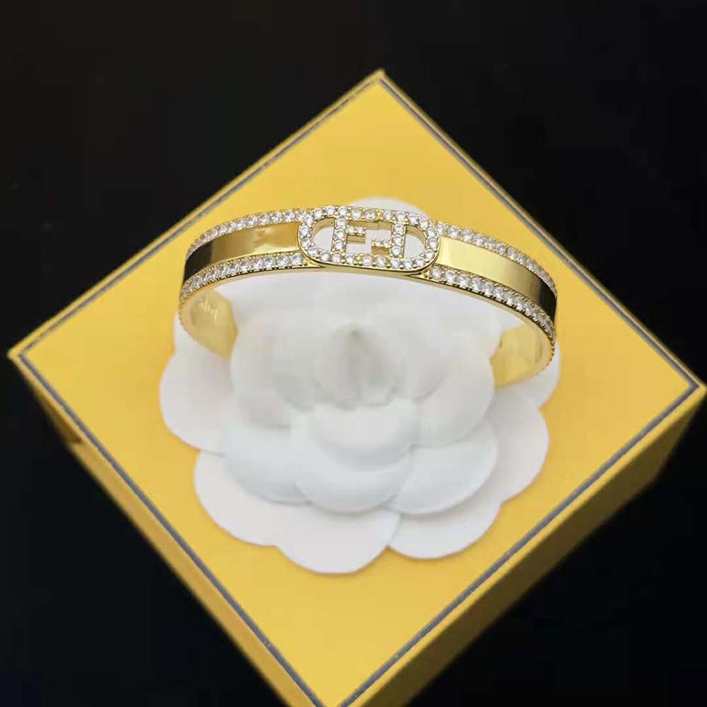 Side angle showcasing Fendi Women O’Lock Bracelet Gold-colored finish