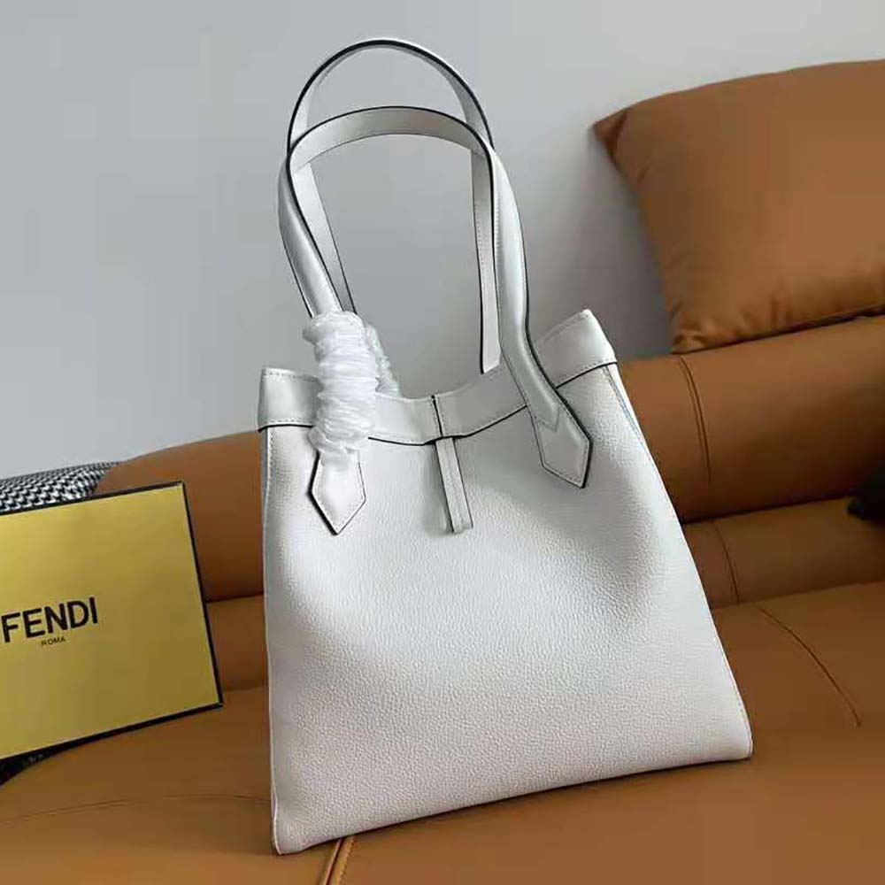 Side view showing foldable silhouette of Fendi Women Origami Medium White Leather Bag