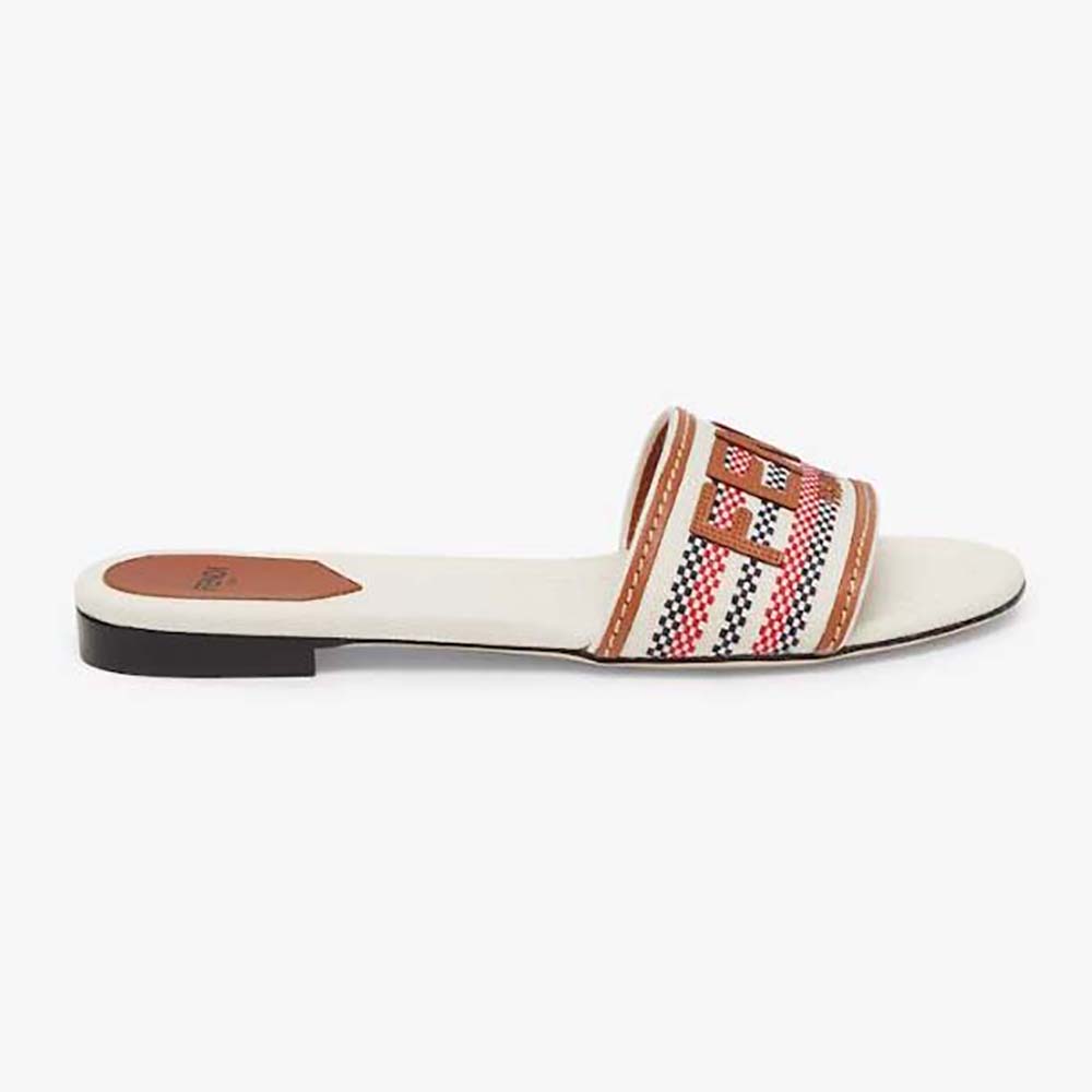 Side angle of Fendi Women Signature Beige Canvas Slides showing canvas texture