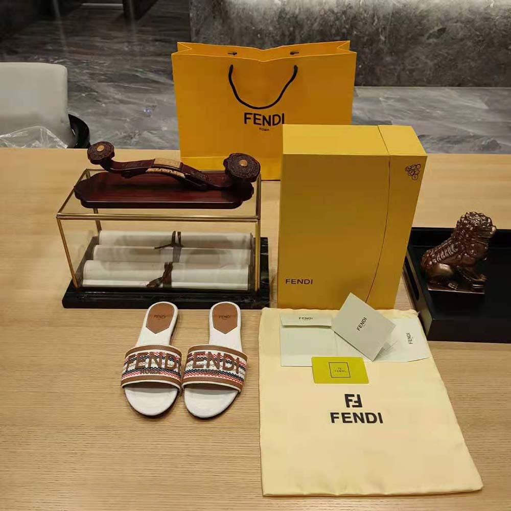 Top view of Fendi Women Signature Beige Canvas Slides highlighting FF logo detail