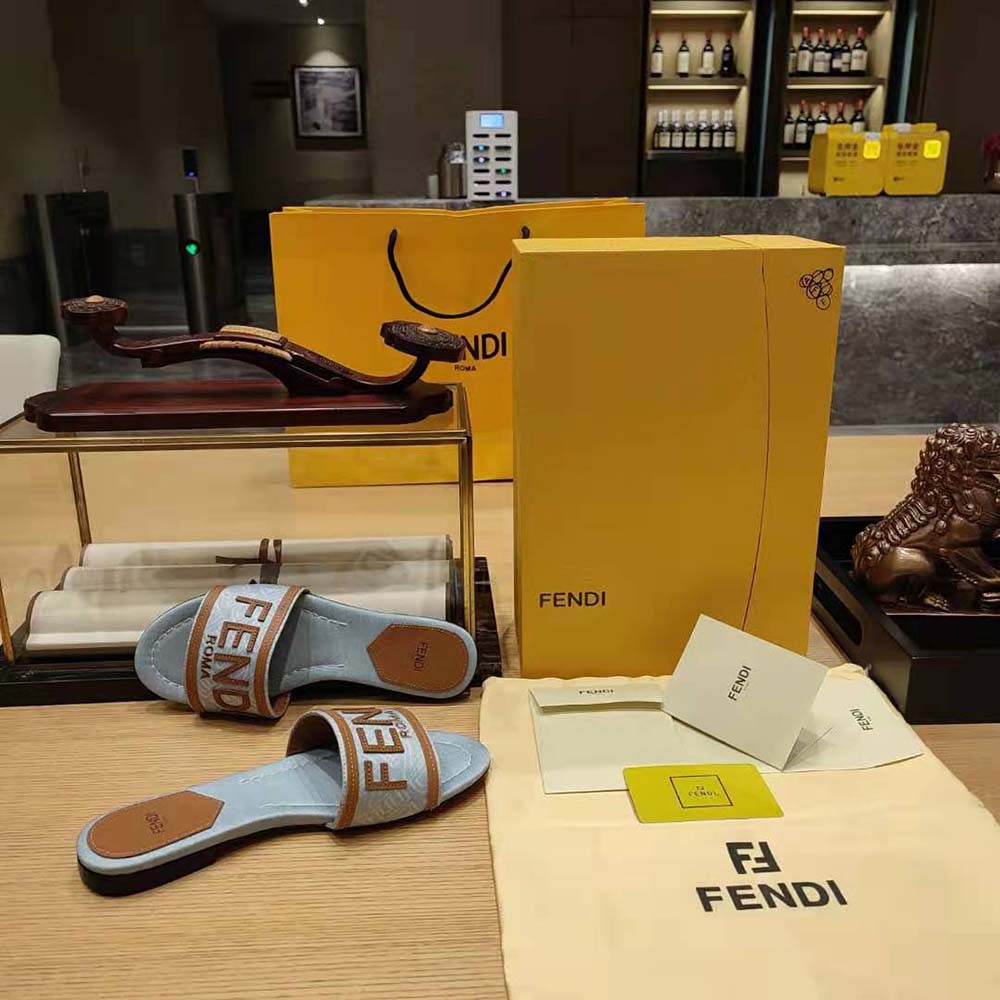 Close-up detail of slip-on design on Fendi Women Signature Light Blue Denim Slides