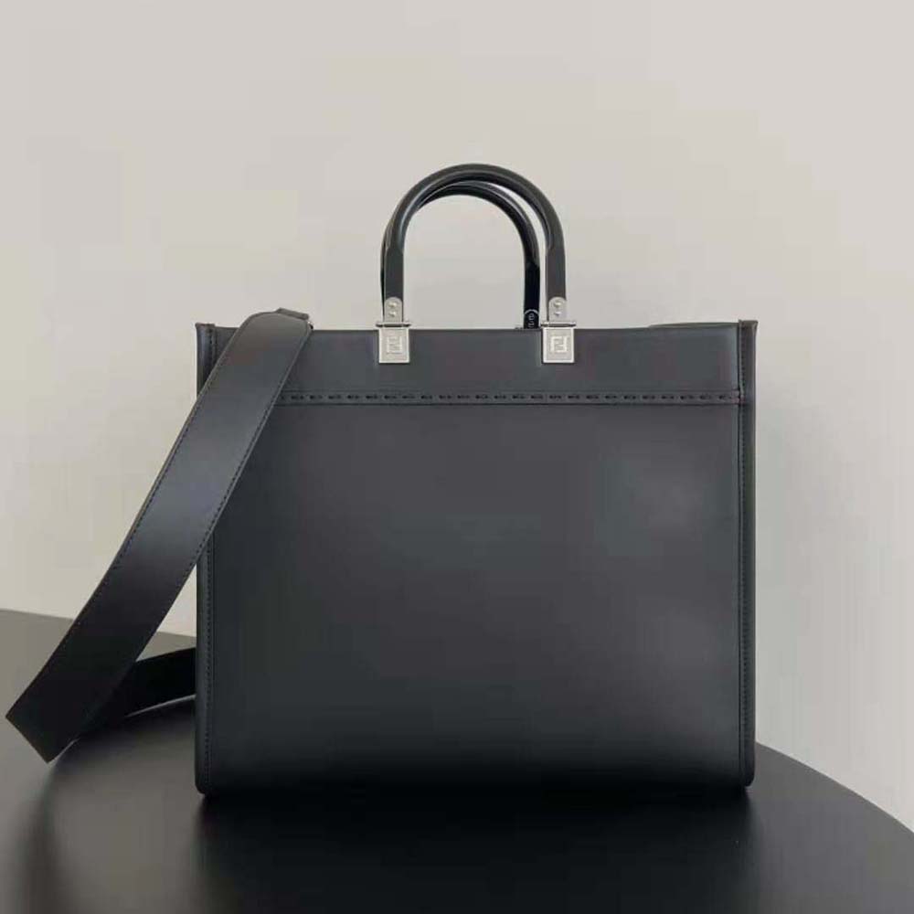 Side angle showing silhouette of Fendi Women Sunshine Medium Black Leather Shopper