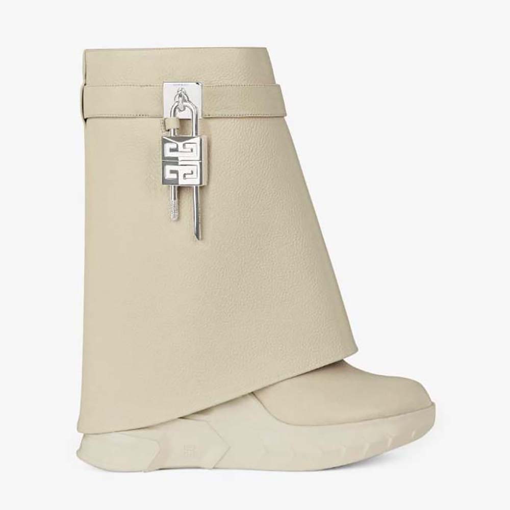 Side view of Givenchy Women Shark Lock Biker Ankle Boots in beige leather