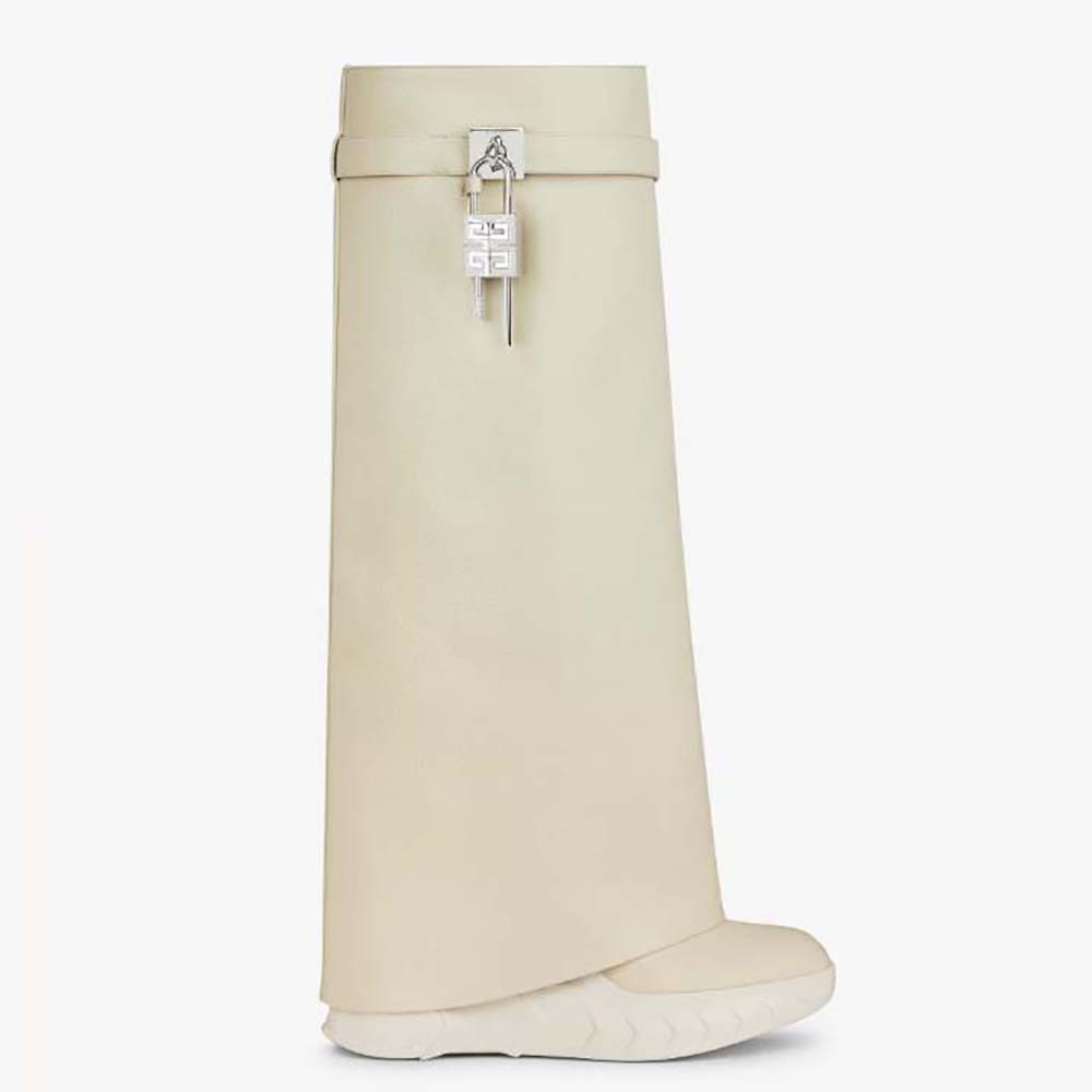 Side view of Givenchy Women Shark Lock Biker Boots in beige leather