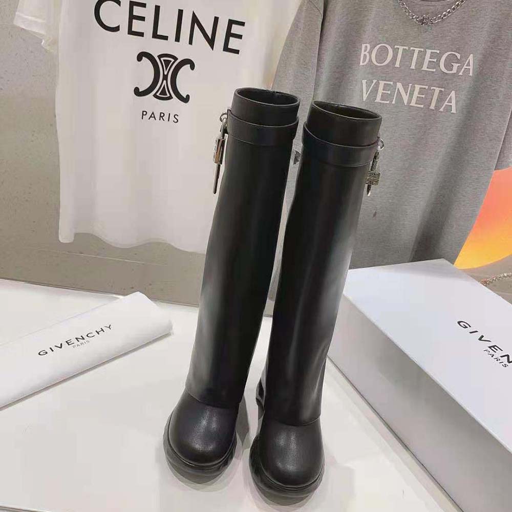 Close-up of Shark lock metal hardware on Givenchy Women Shark Lock boots