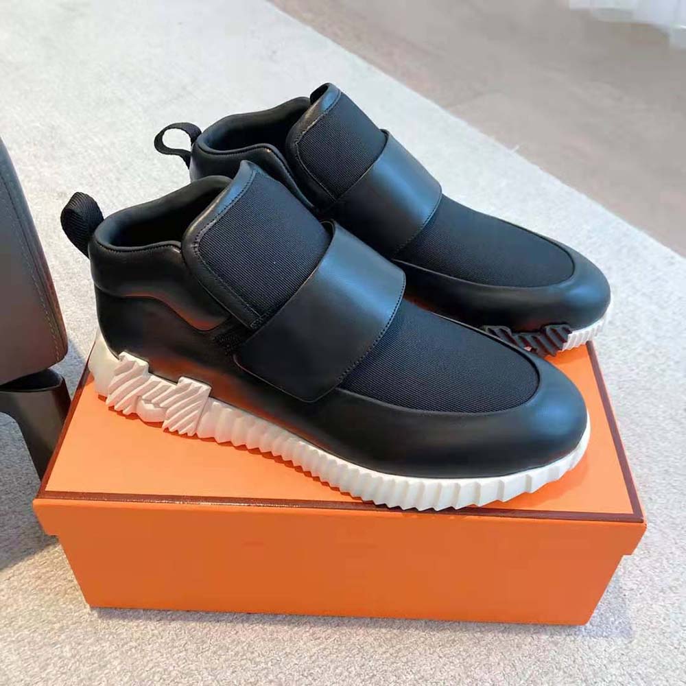 Overhead view showing laces and stretch canvas on Hermes Men H Sneaker