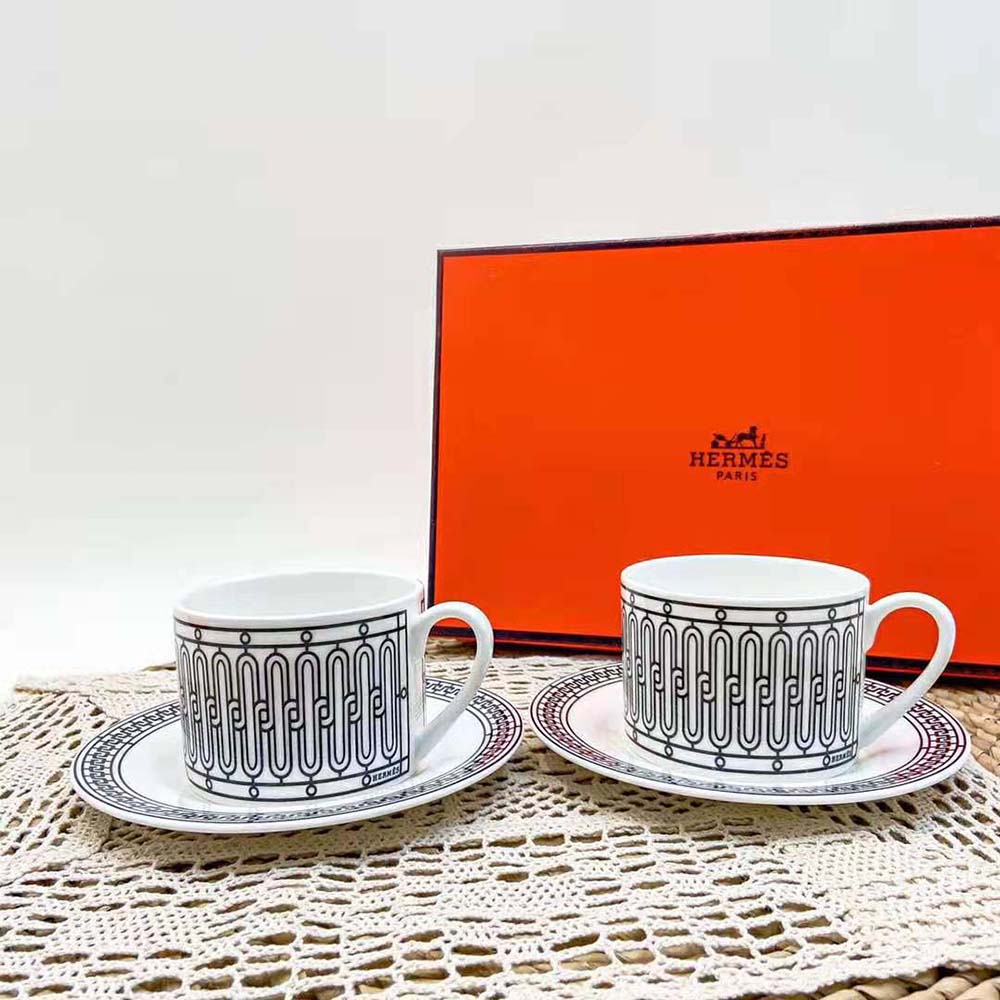 Side angle showing Hermes Unisex H Deco Tea Cup handle and saucer