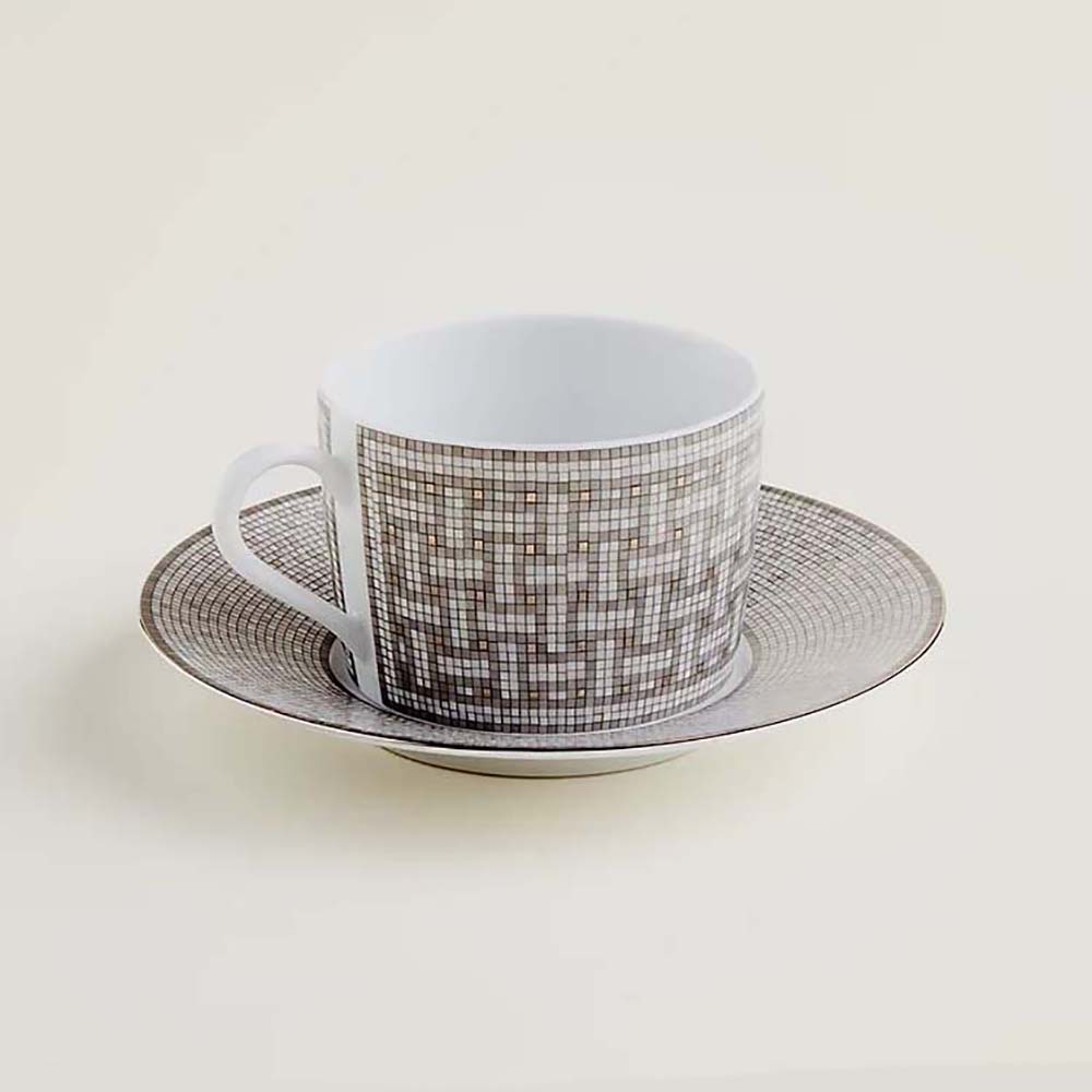 Front view of Hermes Unisex Mosaique Au 24 Platinum Tea Cup and Saucer